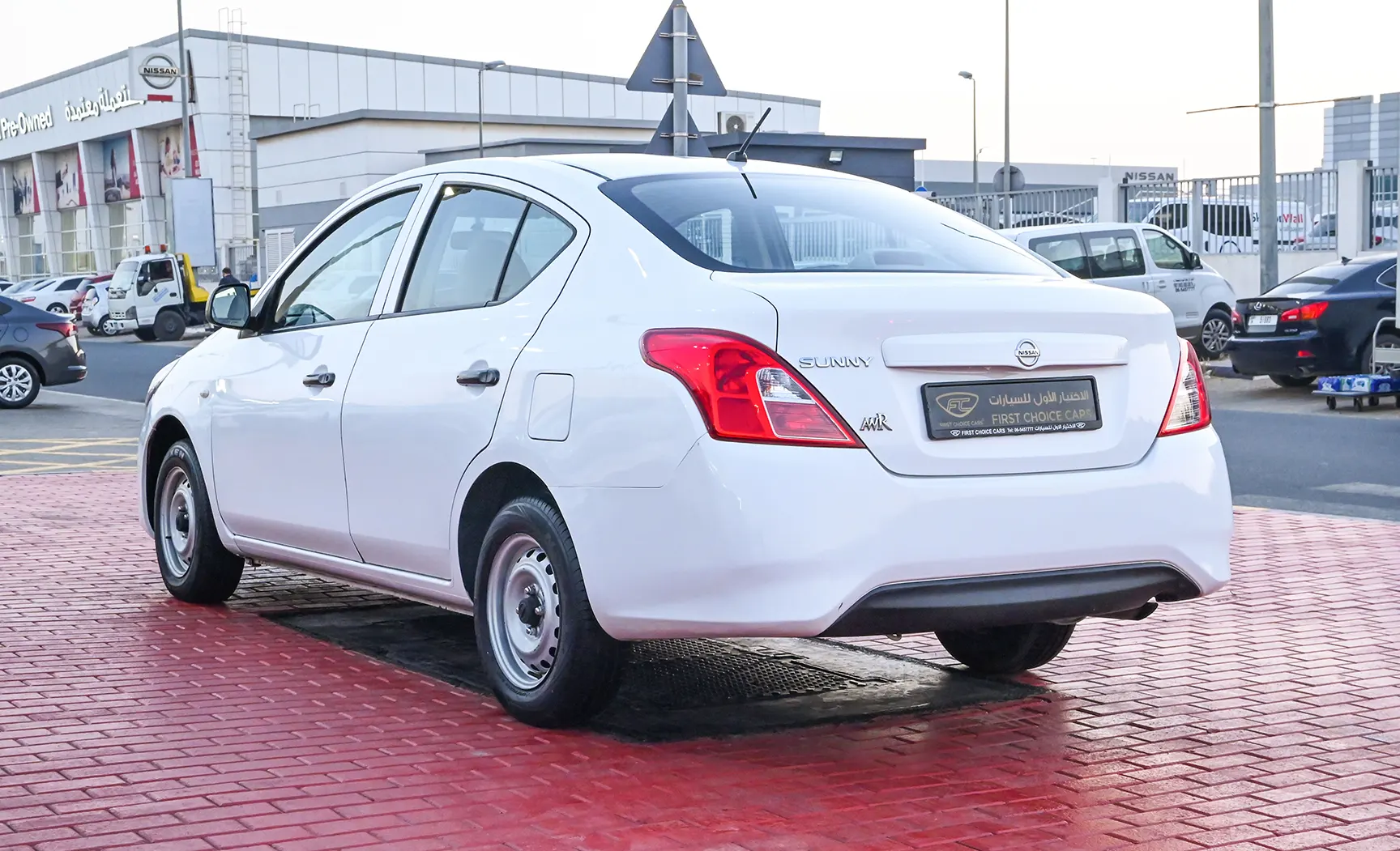 Used 2017 Nissan Sunny S White – Left Back Diagonal (45°) View at First Choice Cars Sharjah