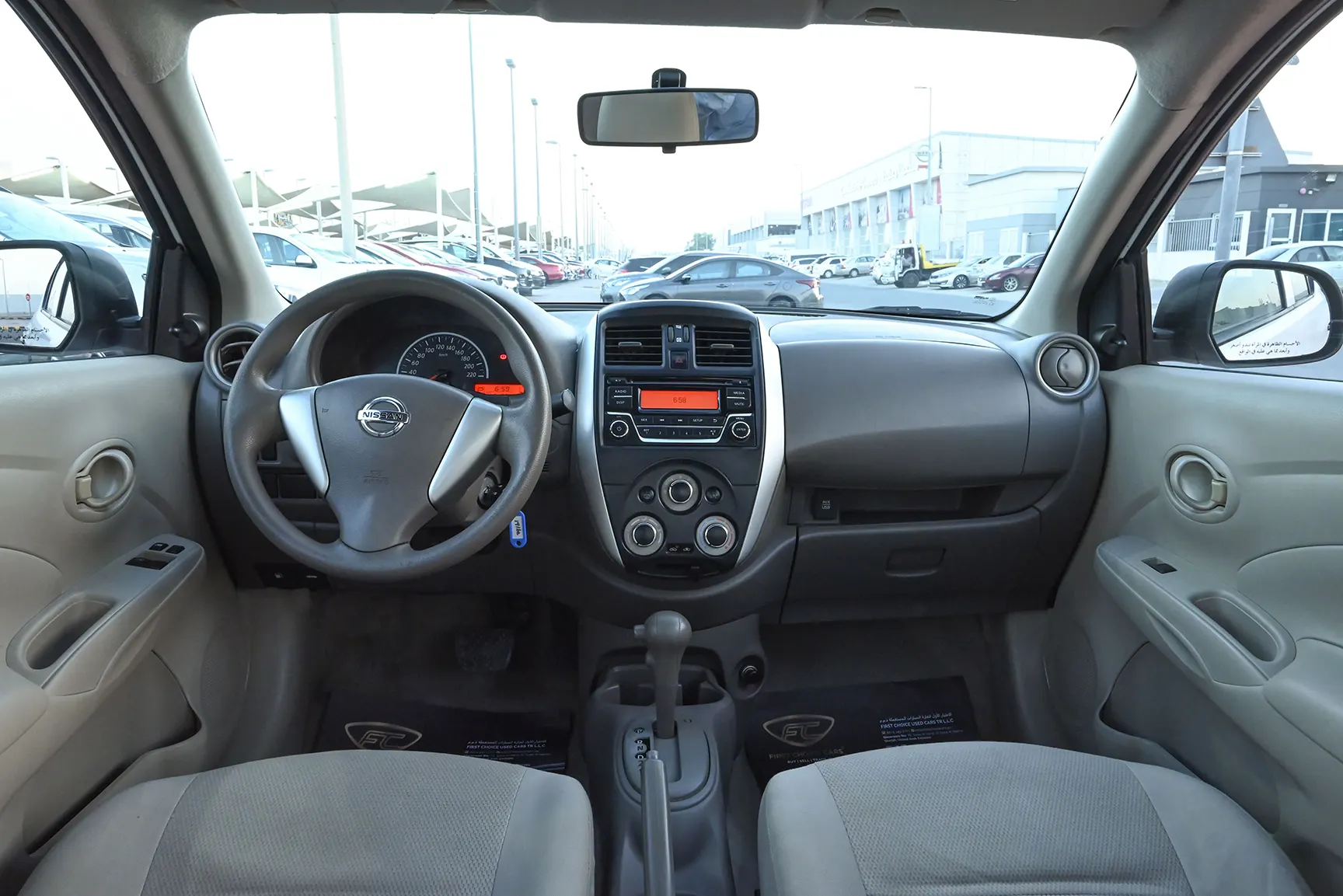 Used 2017 Nissan Sunny S White – Front Cabin / Dashboard Full View at First Choice Cars Sharjah