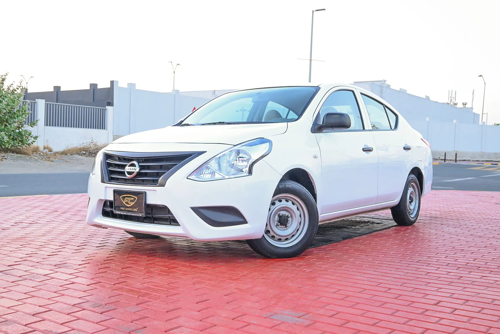Used 2017 Nissan Sunny S White – Left Front Diagonal (45°) View at First Choice Cars Sharjah