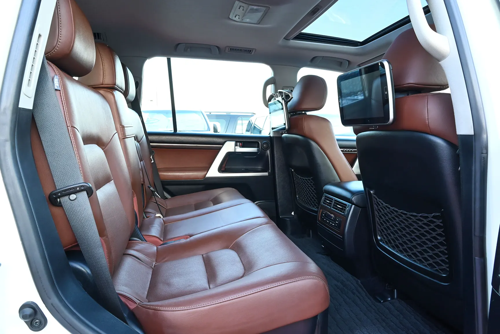 Used 2017 Toyota Land Cruiser VXR White – Rear Passenger Side Cabin View at First Choice Cars Sharjah