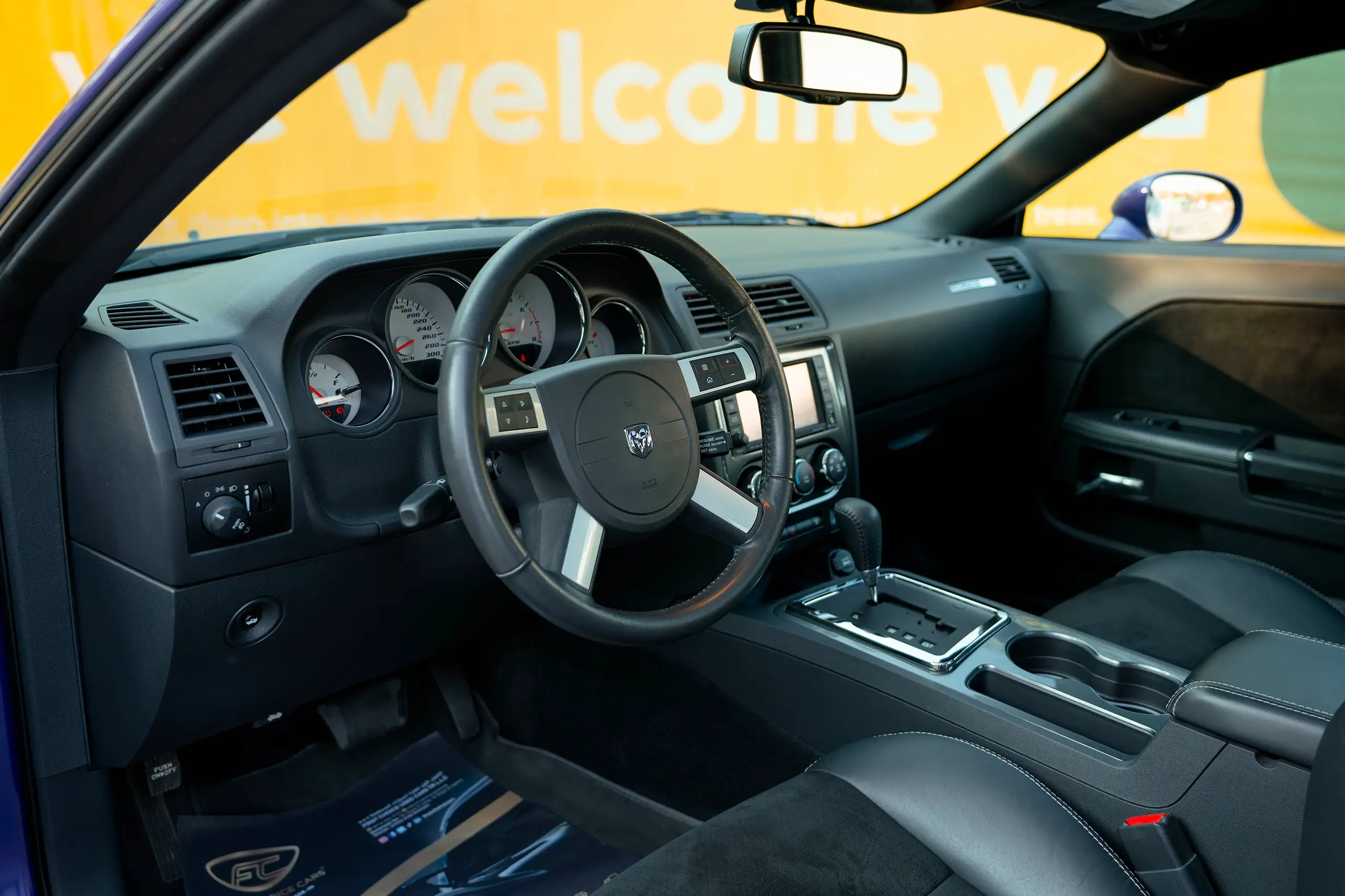 Used 2010 Dodge Challenger SRT8 in Purple – Driver Side Dashboard & Steering View for Sale at First Choice Cars Dubai Sharjah
