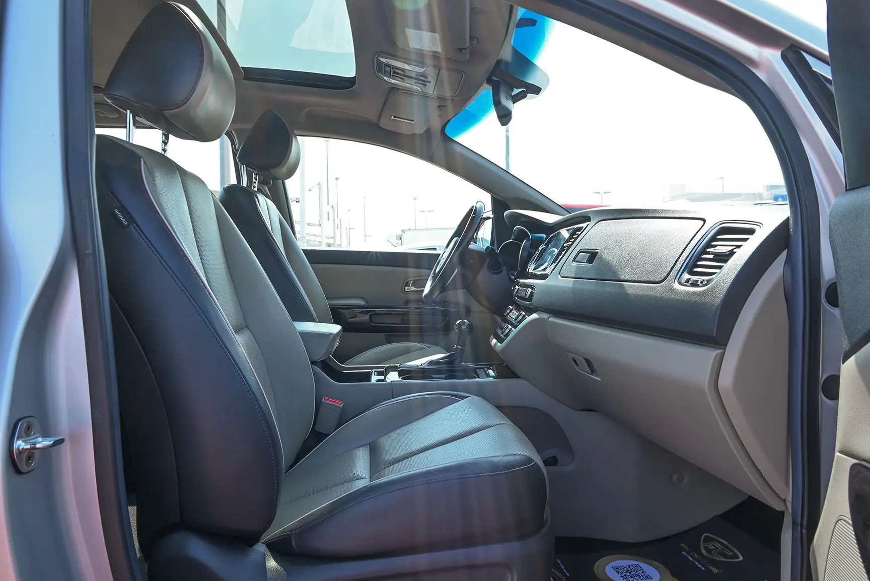 Used 2017 KIA Carnival Grand Carnival Silver – Front Passenger Side Cabin View at First Choice Cars Sharjah