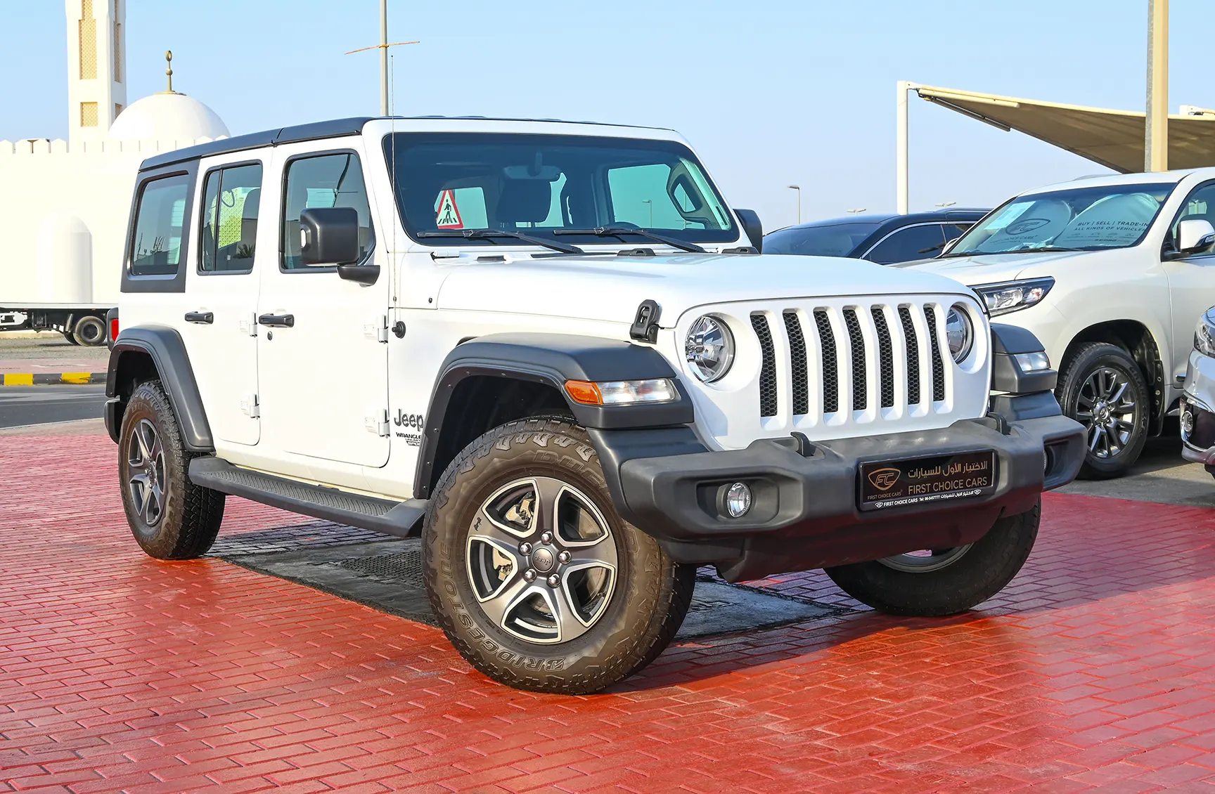Used 2019 Jeep Wrangler Unlimited Sport White – Right Front Diagonal (45°) View at First Choice Cars Sharjah