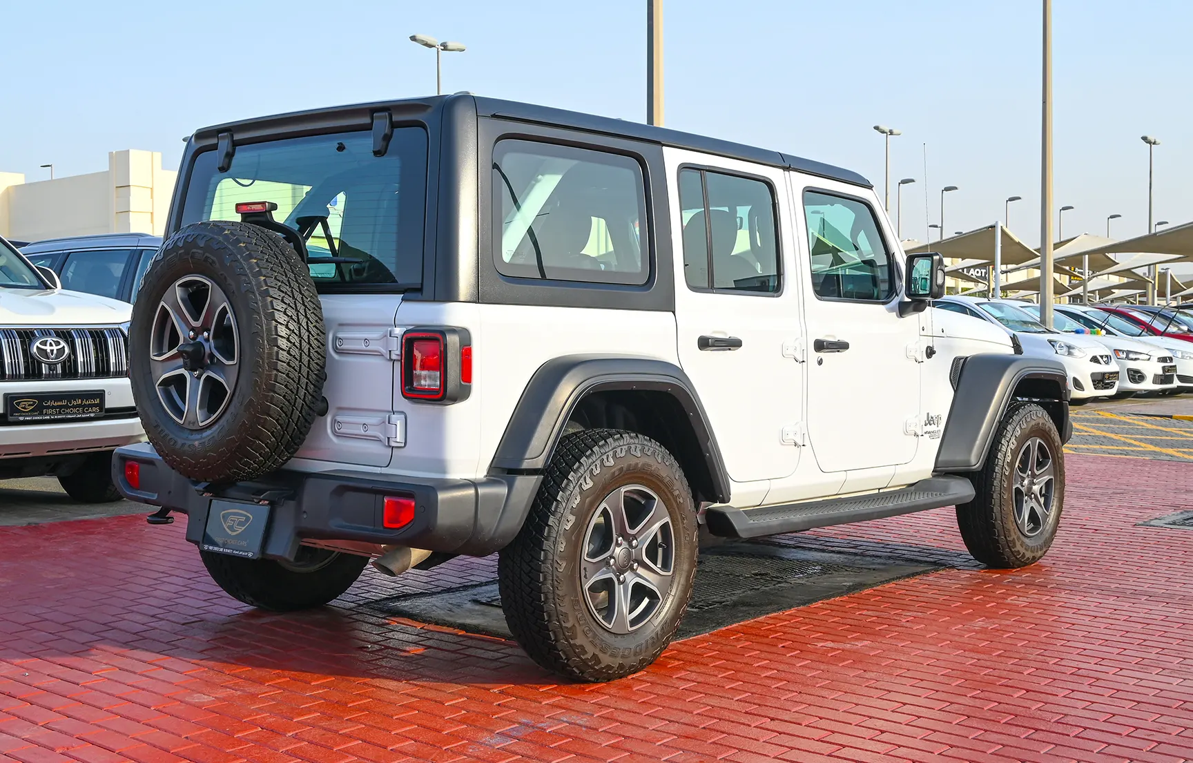 Used 2019 Jeep Wrangler Unlimited Sport White – Right Back Diagonal (45°) View at First Choice Cars Sharjah