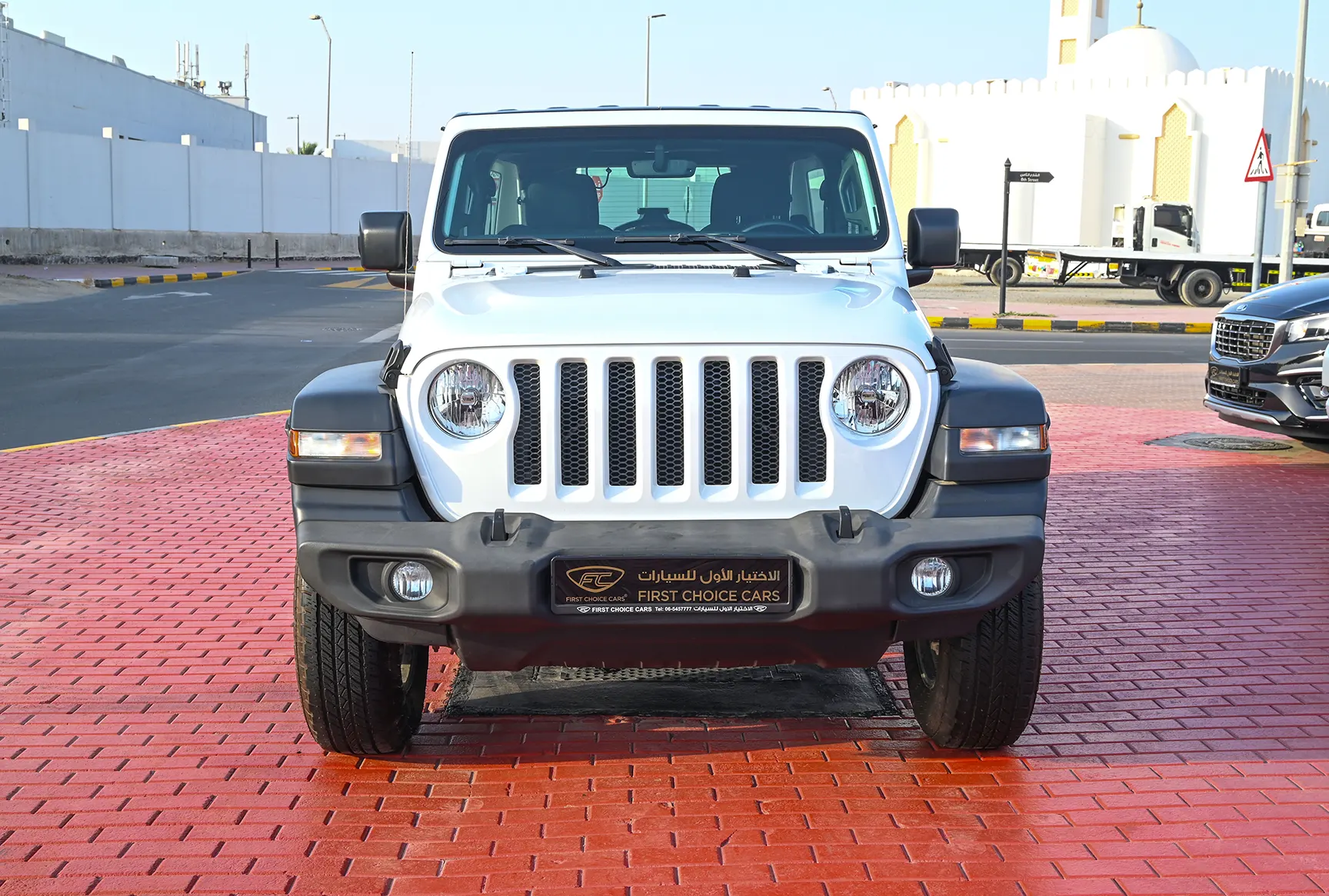 Used 2019 Jeep Wrangler Unlimited Sport White – Front View at First Choice Cars Sharjah