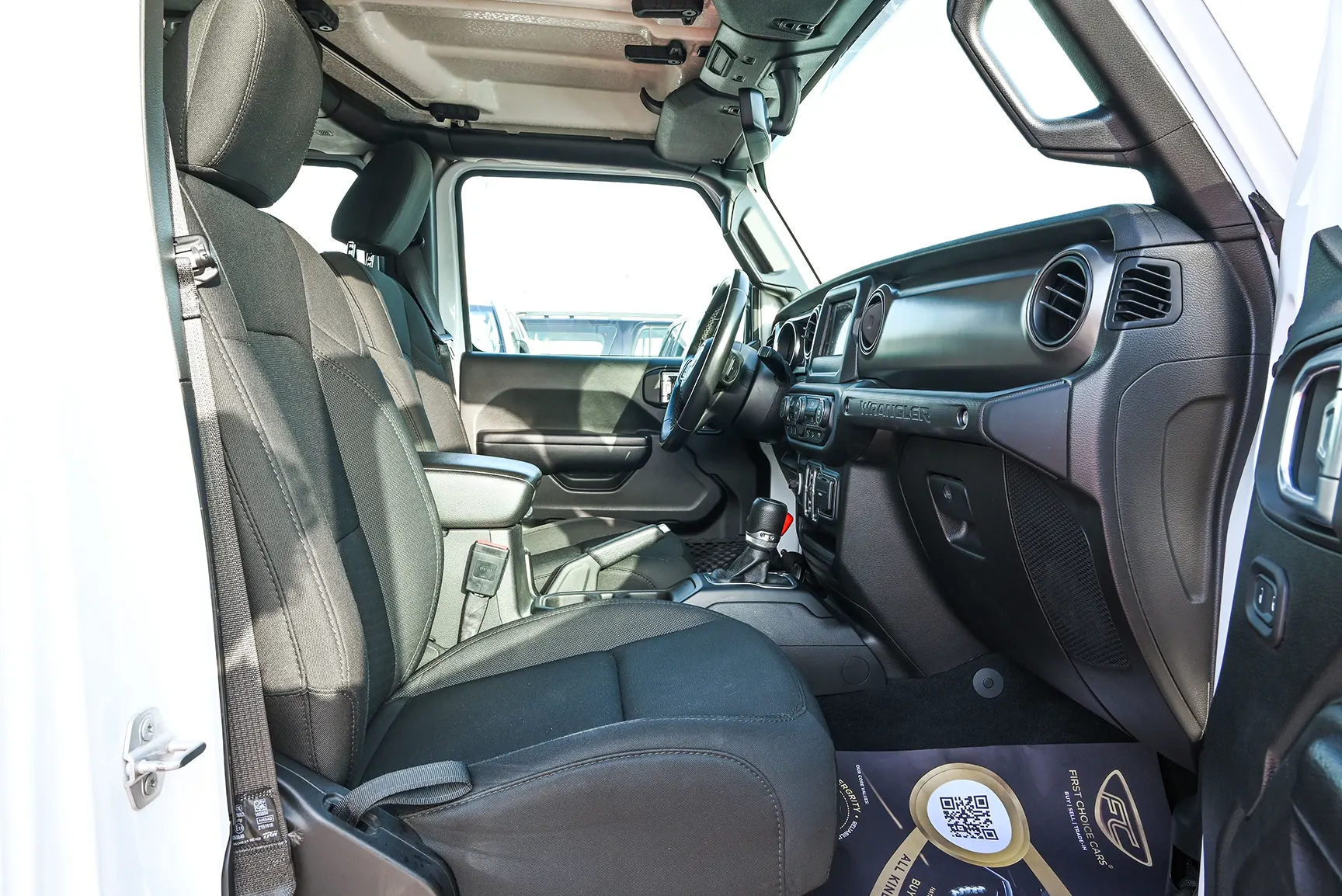 Used 2019 Jeep Wrangler Unlimited Sport White – Front Passenger Side Cabin View at First Choice Cars Sharjah