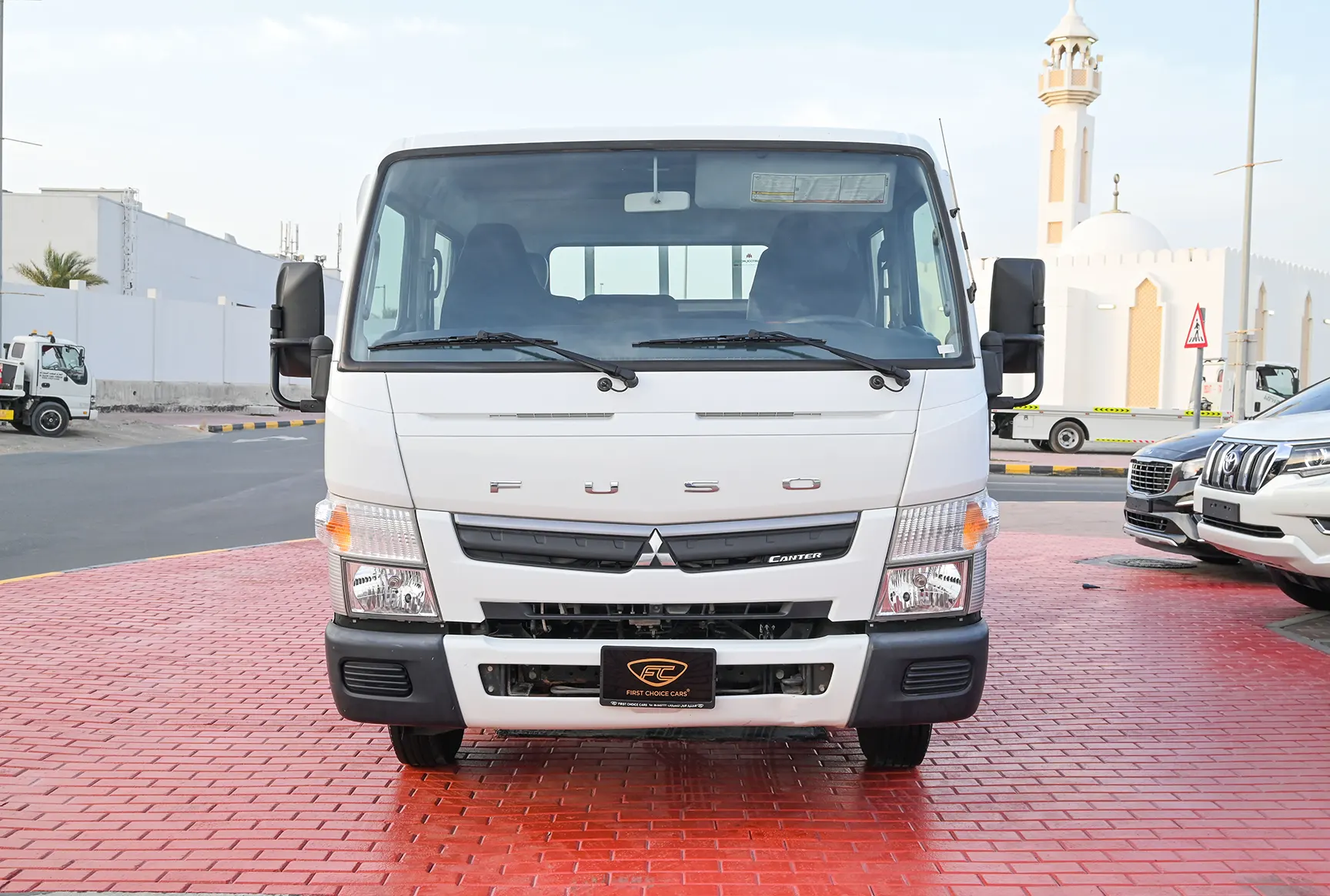 Used 2020 Mitsubishi Canter Double Cabin Cargo Body White – Front View at First Choice Cars Sharjah