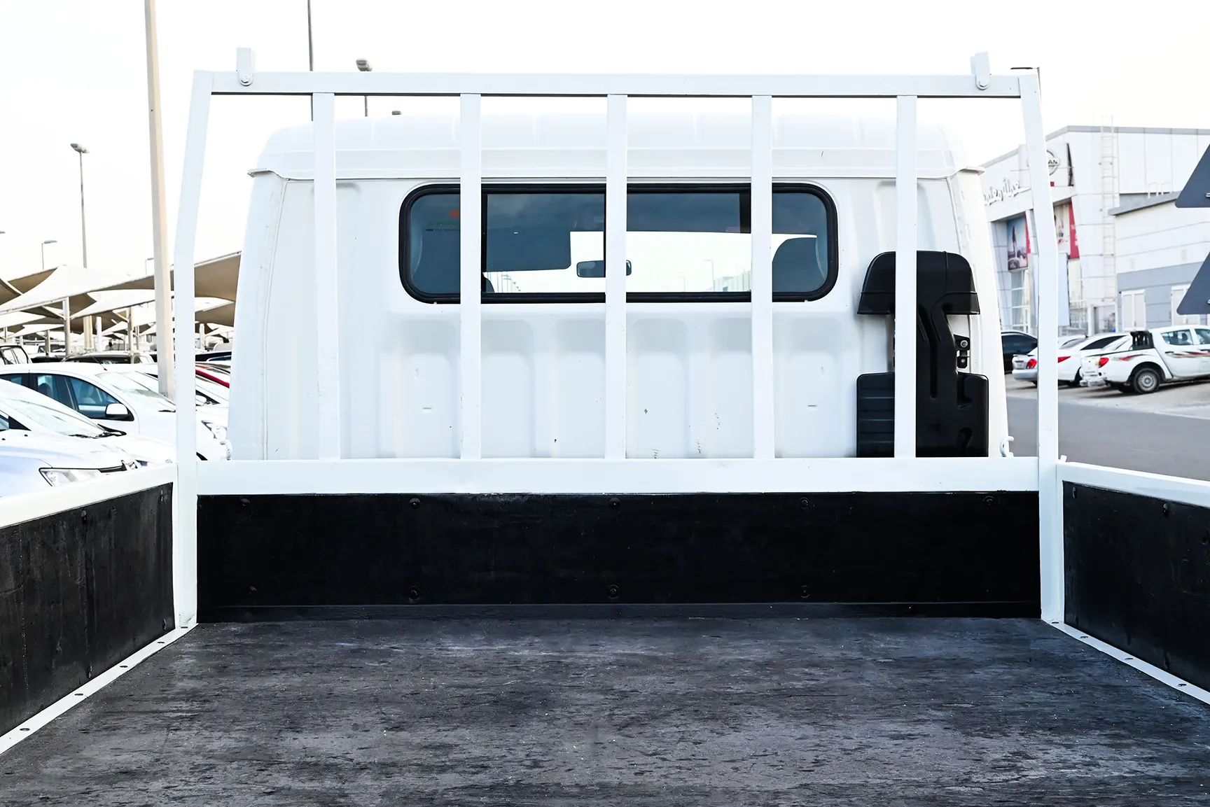 Used 2020 Mitsubishi Canter Double Cabin Cargo Body White – Cargo Bed Rear-to-Front View at First Choice Cars Sharjah