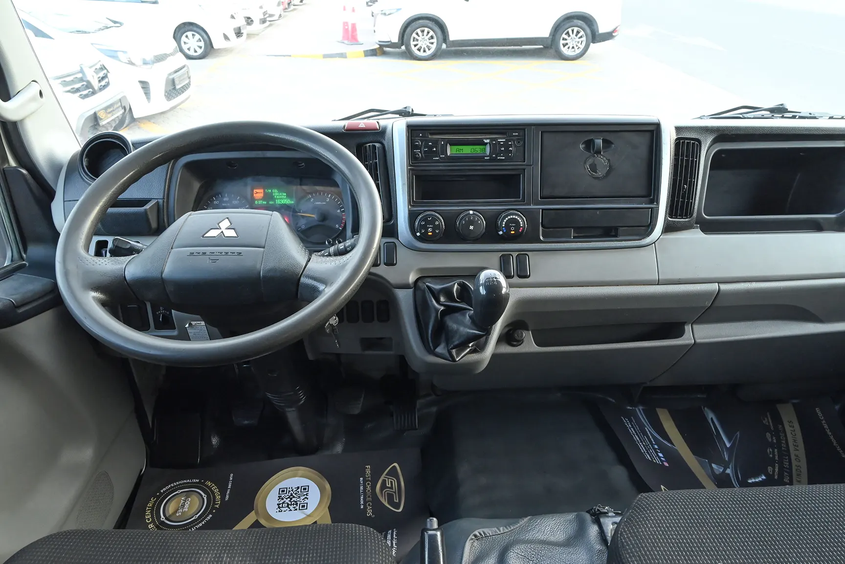 Used 2020 Mitsubishi Canter Double Cabin Cargo Body White – Front Cabin / Dashboard Full View at First Choice Cars Sharjah