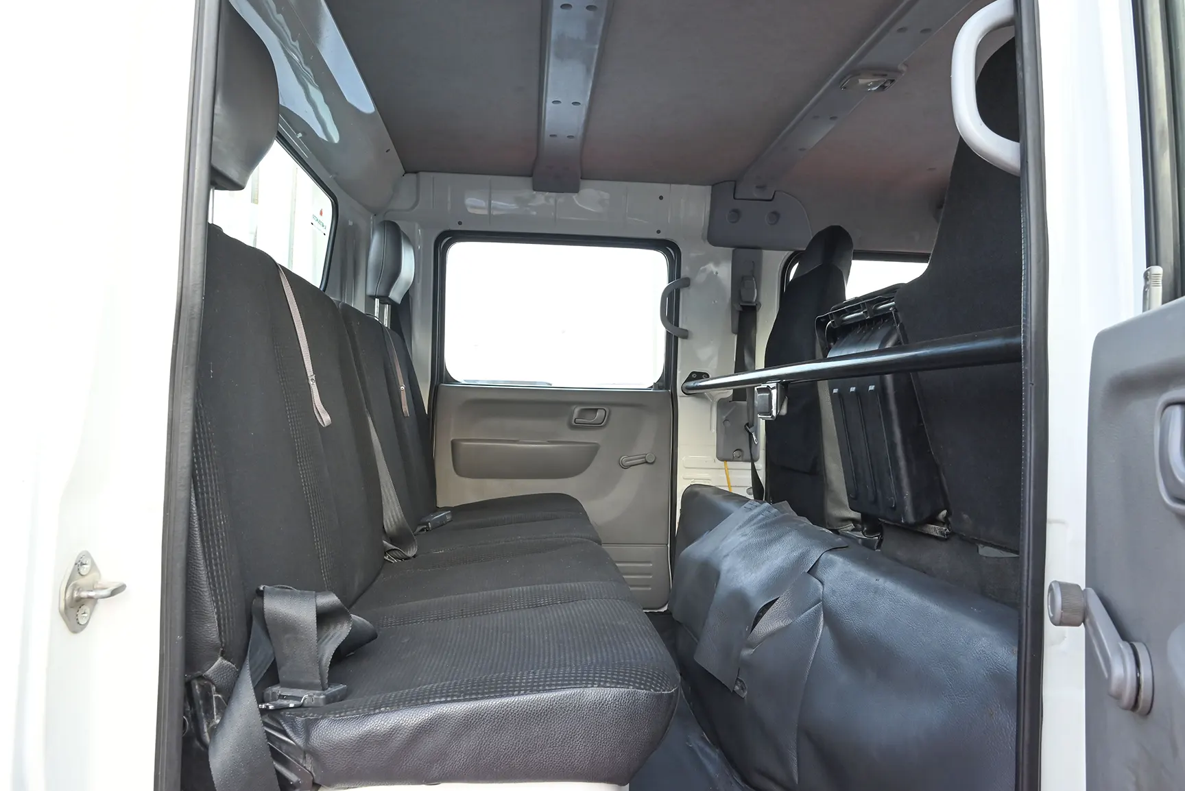 Used 2020 Mitsubishi Canter Double Cabin Cargo Body White – Rear Passenger Side Cabin View at First Choice Cars Sharjah