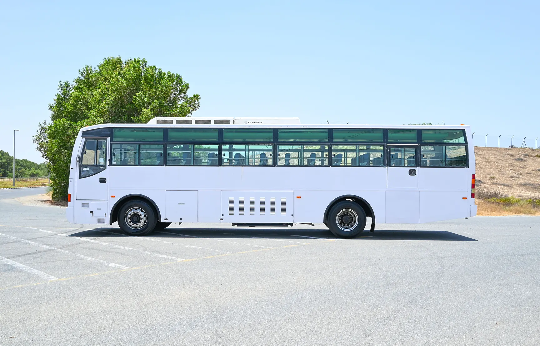 Used 2014 Ashok Leyland Falcon Bus in White – Left Side View