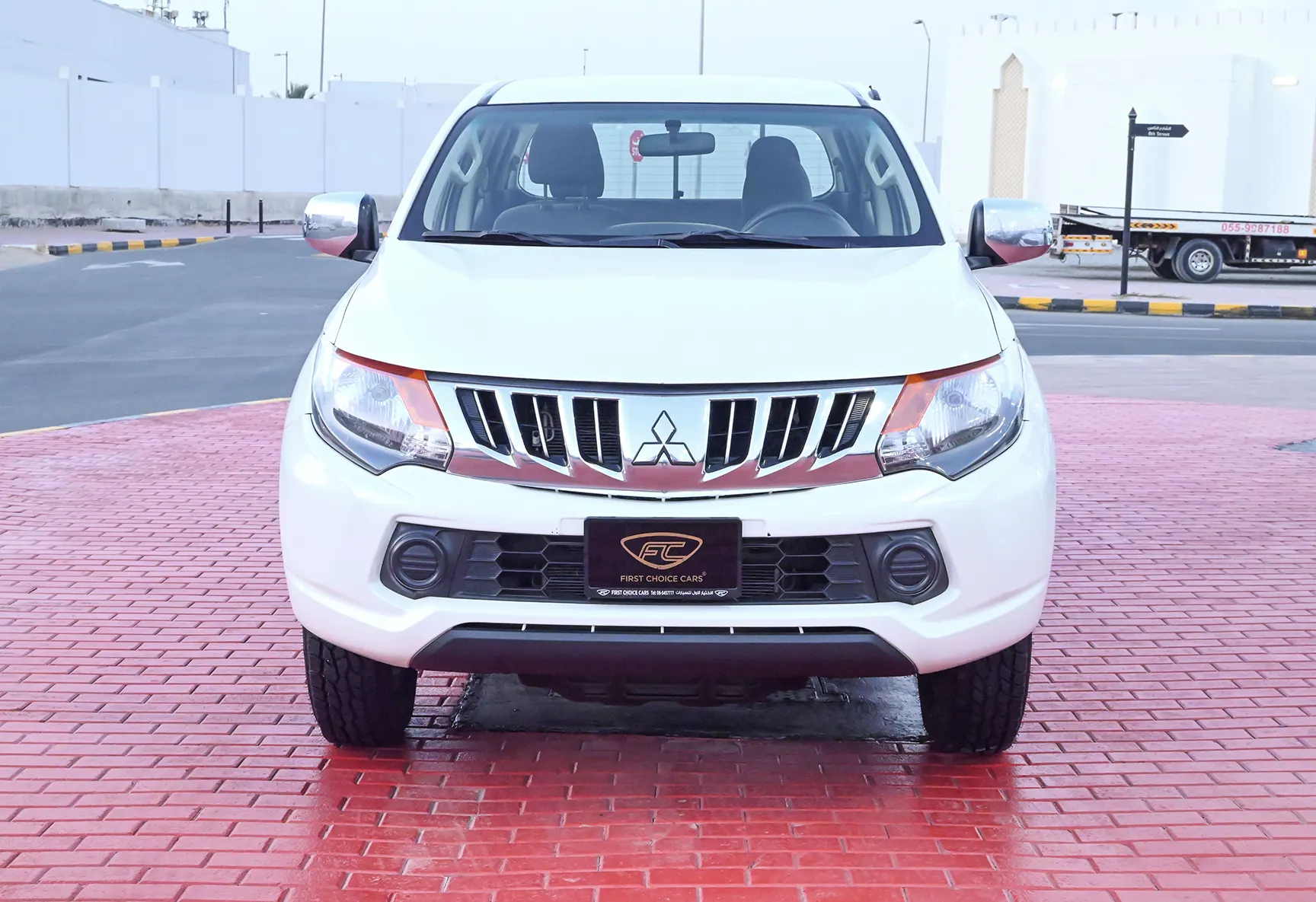 Used 2018 Mitsubishi L200 GL Double Cabin in White – Front View for Sale at First Choice Cars Dubai Sharjah