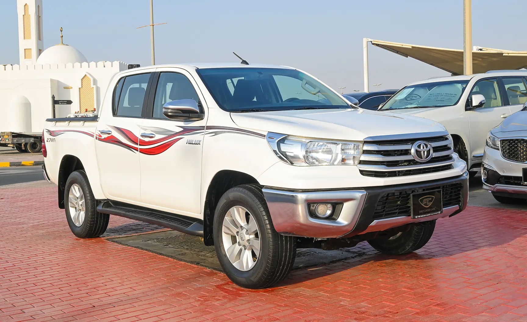 Used 2020 Toyota Hilux GLX Double Cabin White – Right Front Diagonal (45°) View at First Choice Cars Sharjah