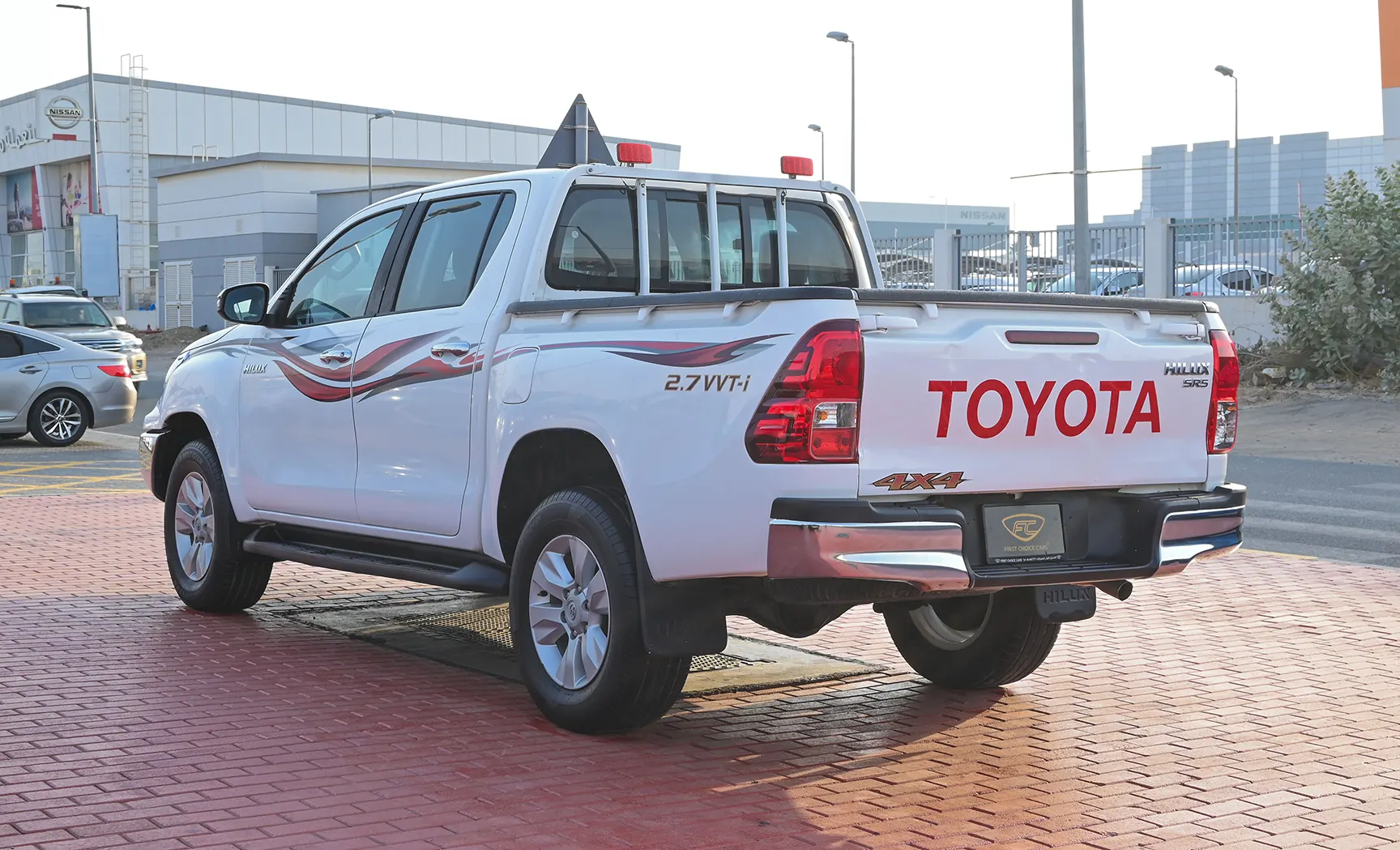 Used 2020 Toyota Hilux GLX Double Cabin White – Left Back Diagonal (45°) View at First Choice Cars Sharjah