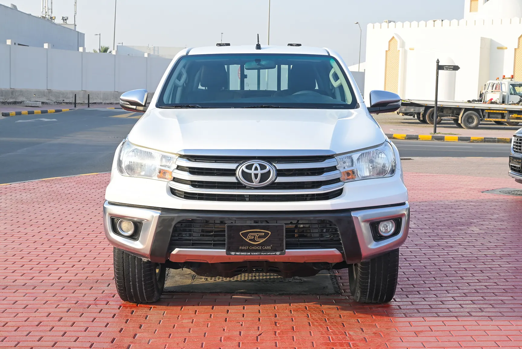 Used 2020 Toyota Hilux GLX Double Cabin White – Front View at First Choice Cars Sharjah
