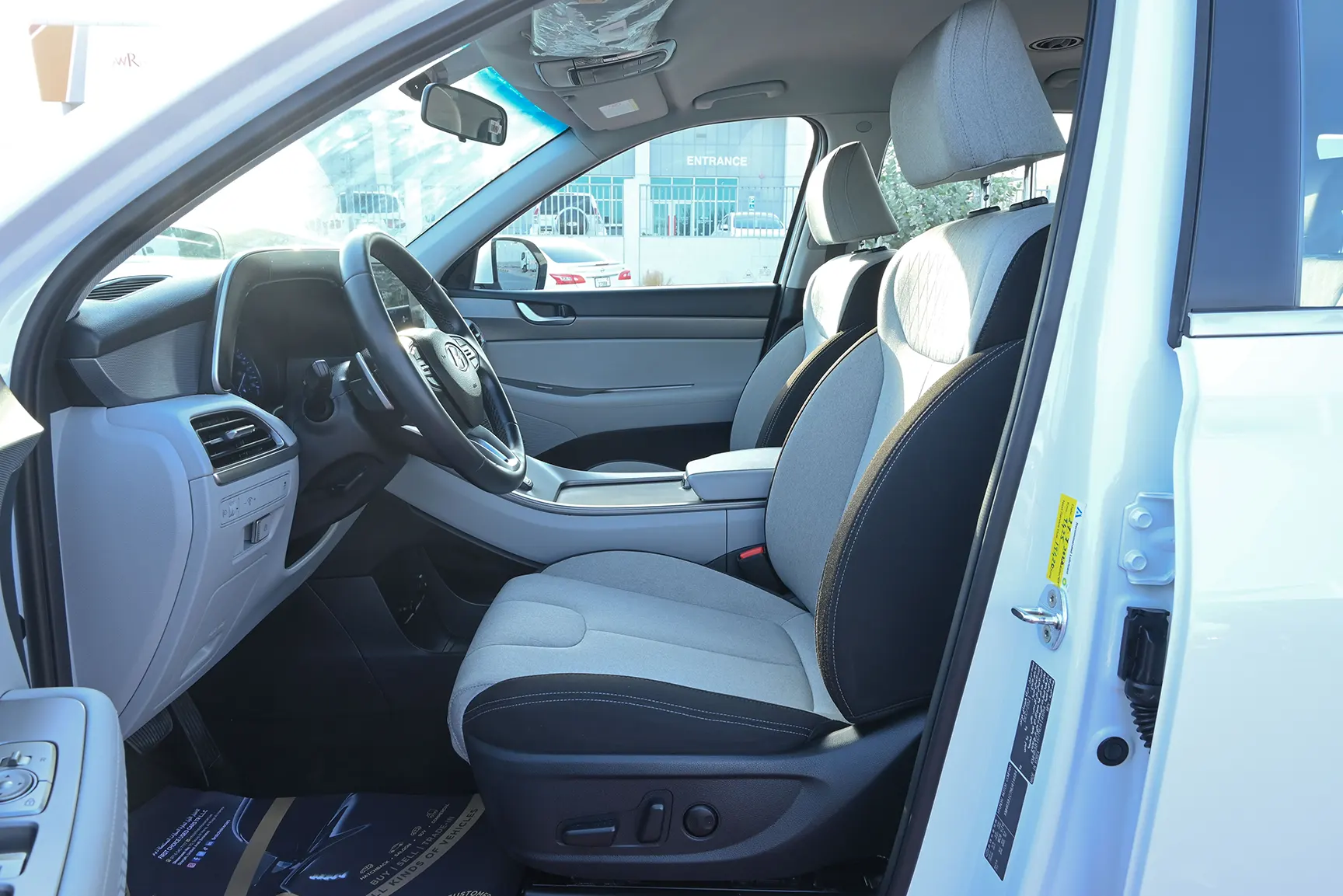 Used 2022 Hyundai Palisade Smart White – Front Driver Side Cabin View at First Choice Cars Sharjah