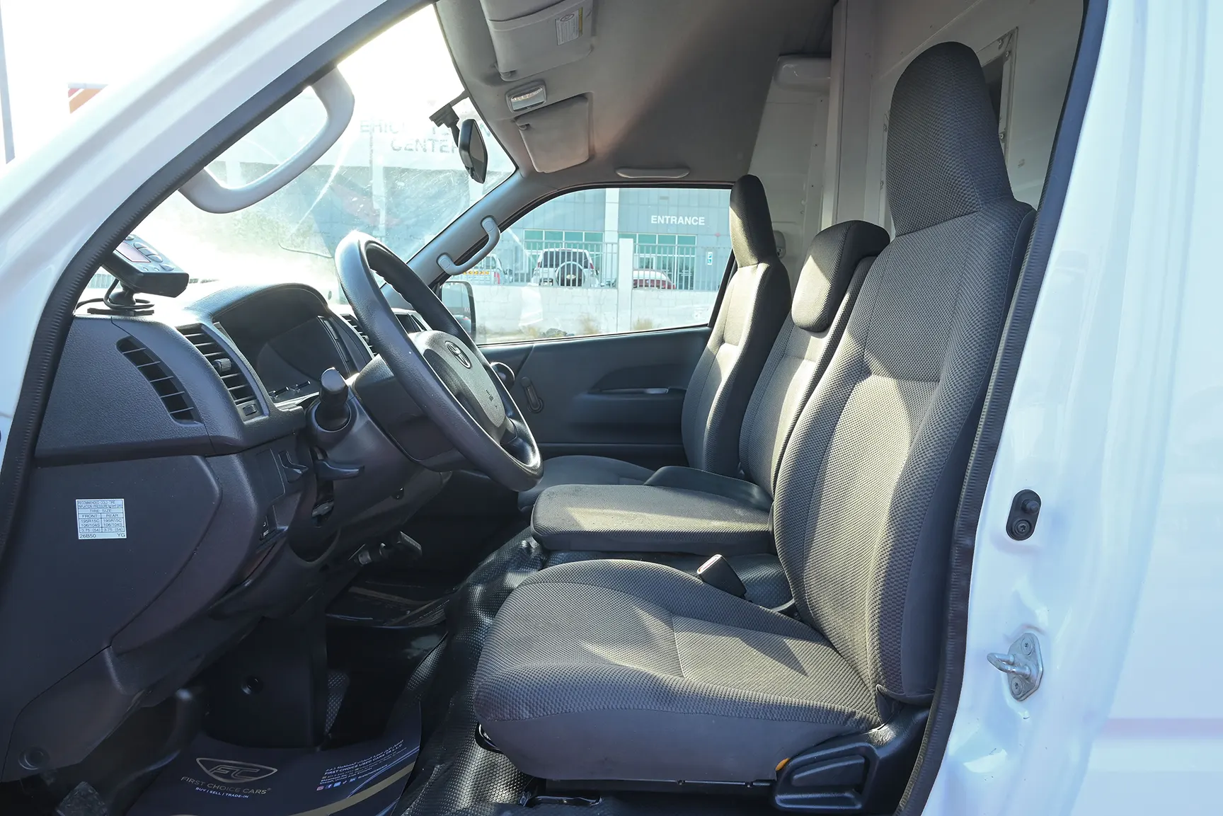 Used 2018 Toyota Hiace GL High Roof White – Front Driver Side Cabin View at First Choice Cars Sharjah