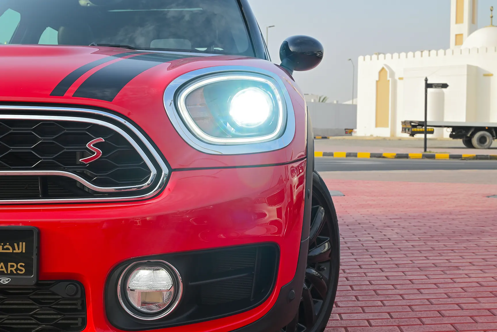 Used 2017 MINI Countryman Cooper S in Red – Headlight Close-up for Sale at First Choice Cars Dubai Sharjah