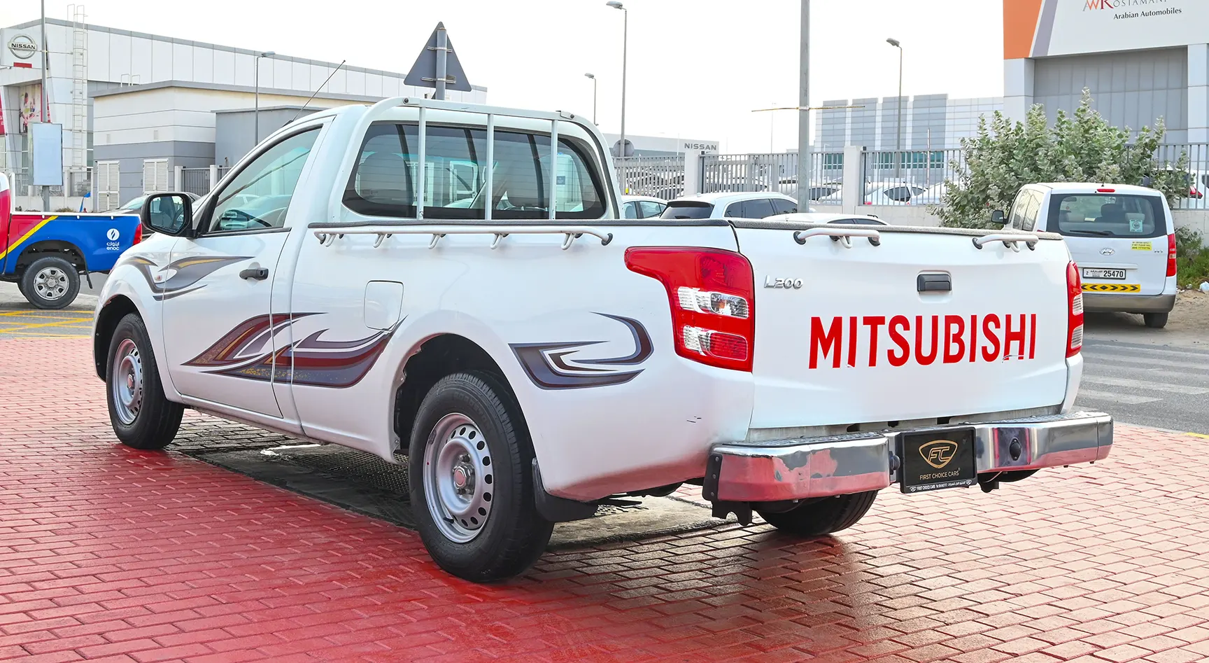 Used 2018 Mitsubishi L200 GL Single Cabin in White – Left Back Diagonal (45°) View for Sale at First Choice Cars Dubai Sharjah