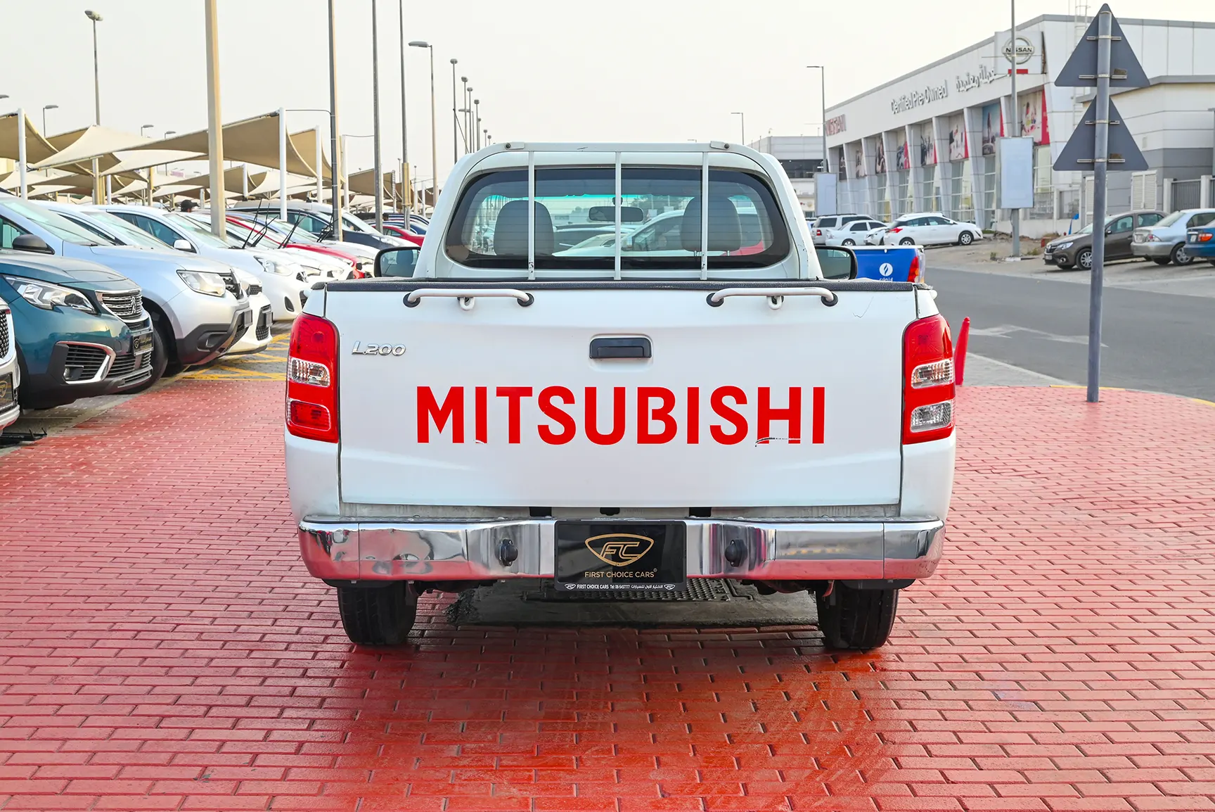 Used 2018 Mitsubishi L200 GL Single Cabin in White – Back/Rear View for Sale at First Choice Cars Dubai Sharjah