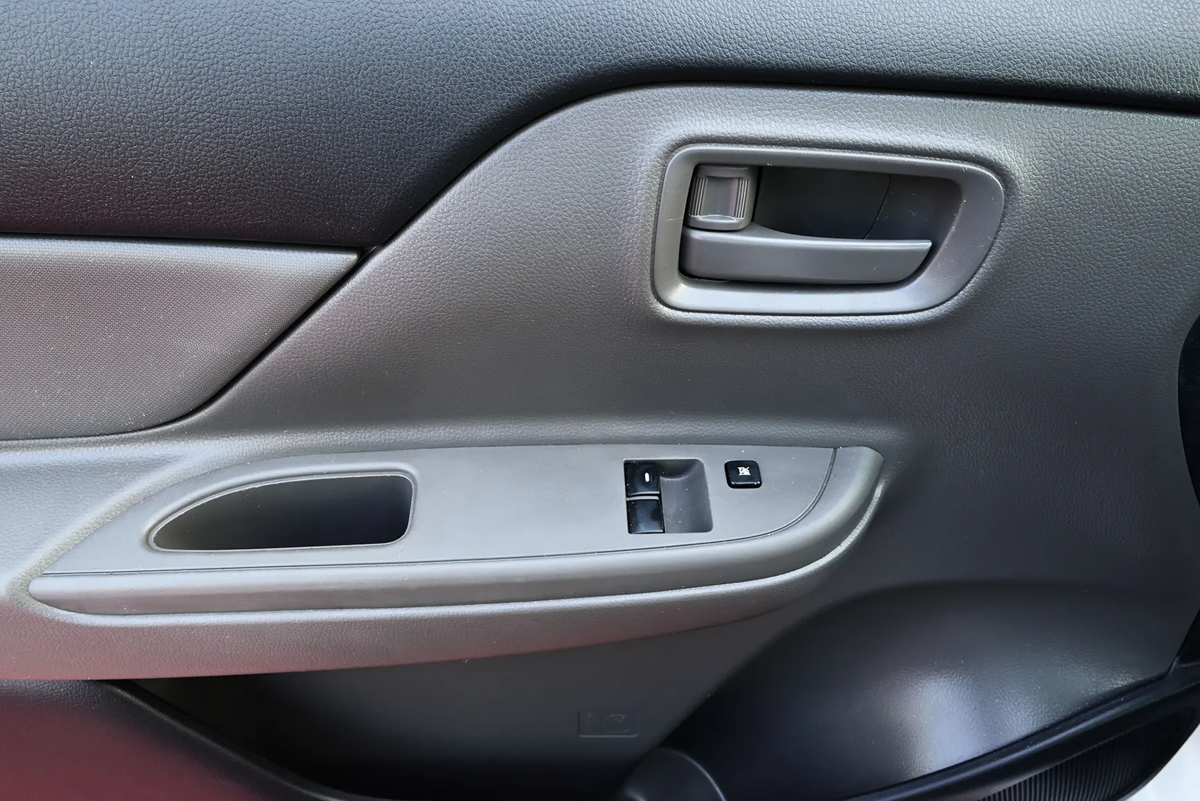 Used 2018 Mitsubishi L200 Single Cab GL White – Driver Door Panel Full View at First Choice Cars Sharjah