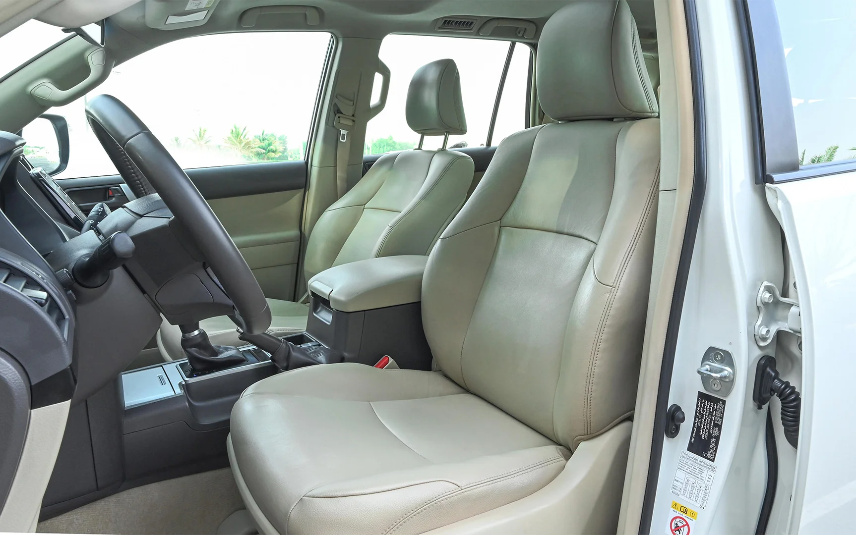 Used 2019 Toyota Prado VXR White – Front Driver Side Cabin View at First Choice Cars Sharjah