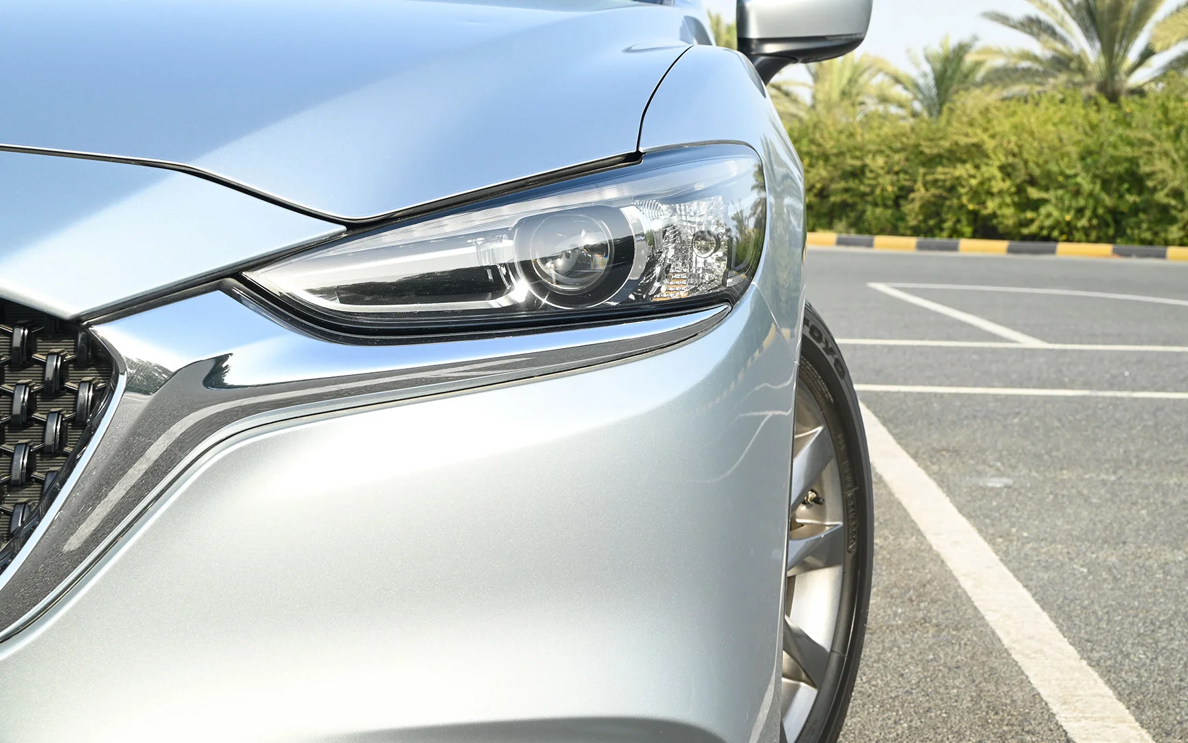 Used 2021 Mazda 6 S Grade Silver – Headlight Close-up at First Choice Cars Sharjah