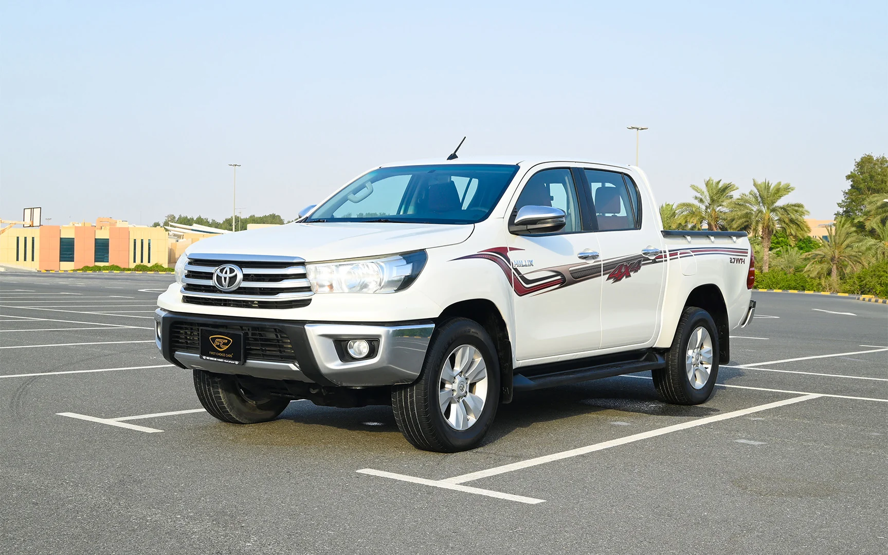 Used 2020 Toyota Hilux GLX Double Cabin White – Left Front Diagonal (45°) View at First Choice Cars Sharjah