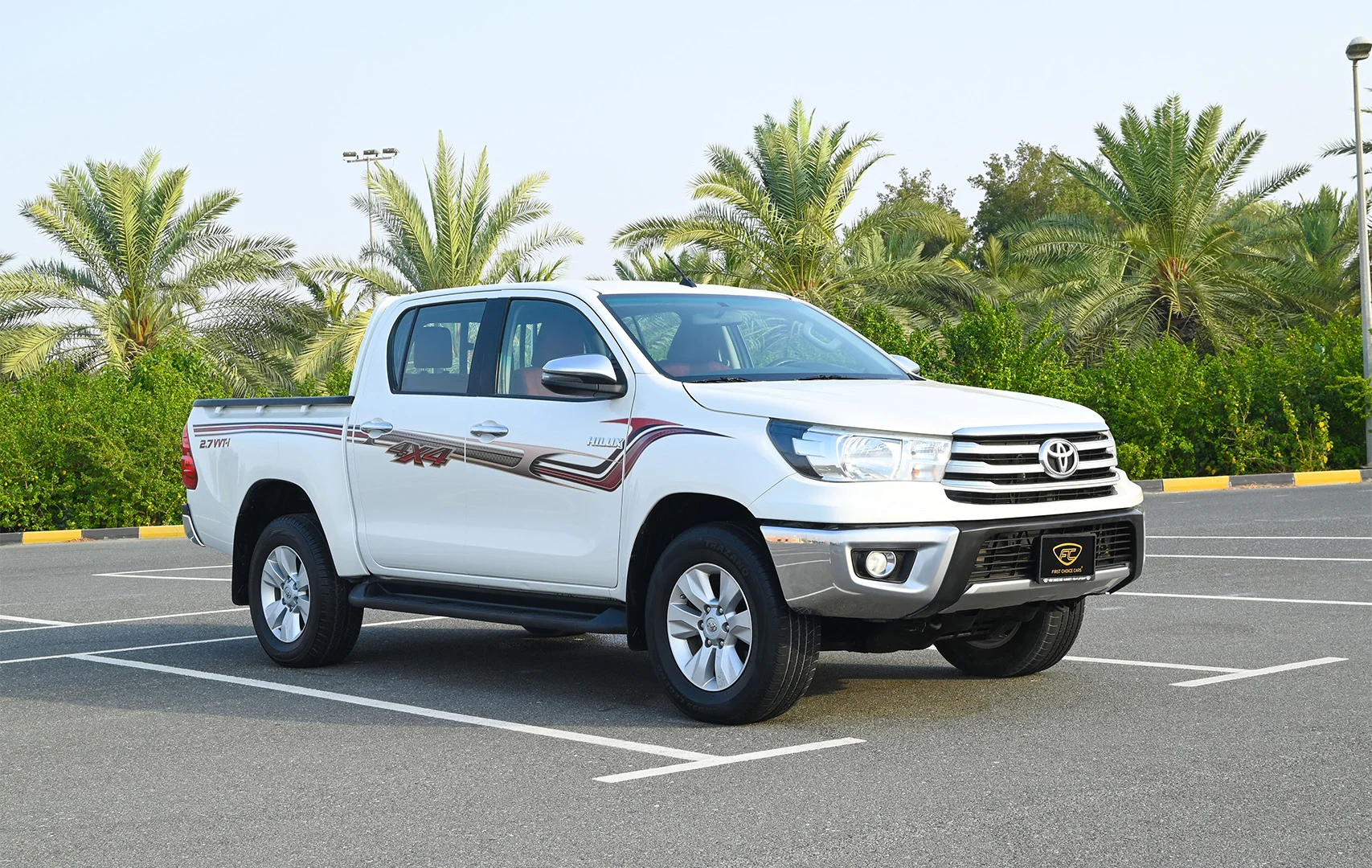Used 2020 Toyota Hilux GLX Double Cabin White – Right Front Diagonal (45°) View at First Choice Cars Sharjah