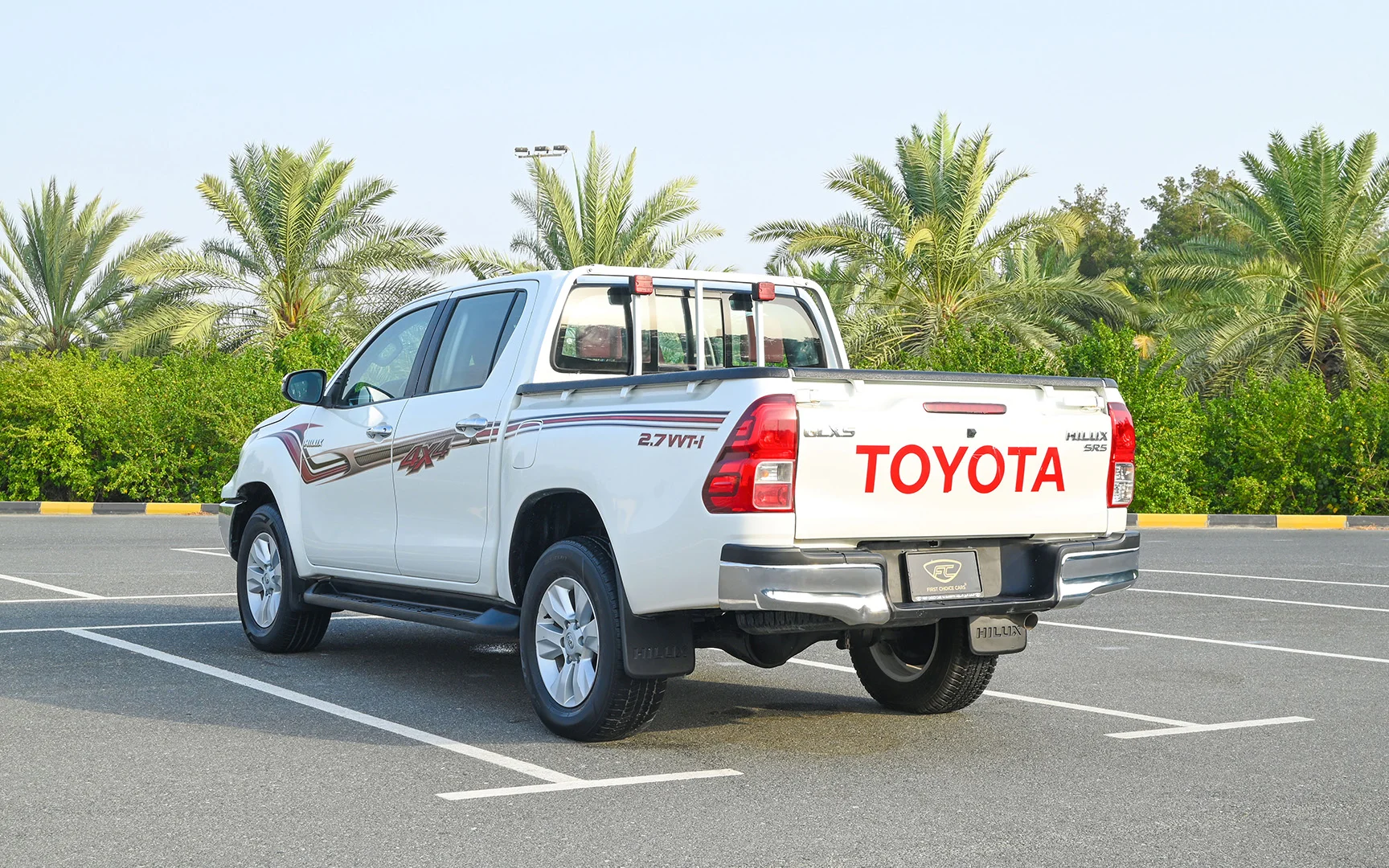 Used 2020 Toyota Hilux GLX Double Cabin White – Left Back Diagonal (45°) View at First Choice Cars Sharjah