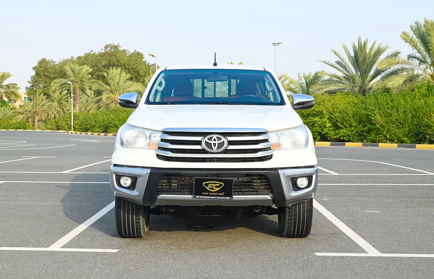 Used 2020 Toyota Hilux GLX Double Cabin White – Front View at First Choice Cars Sharjah