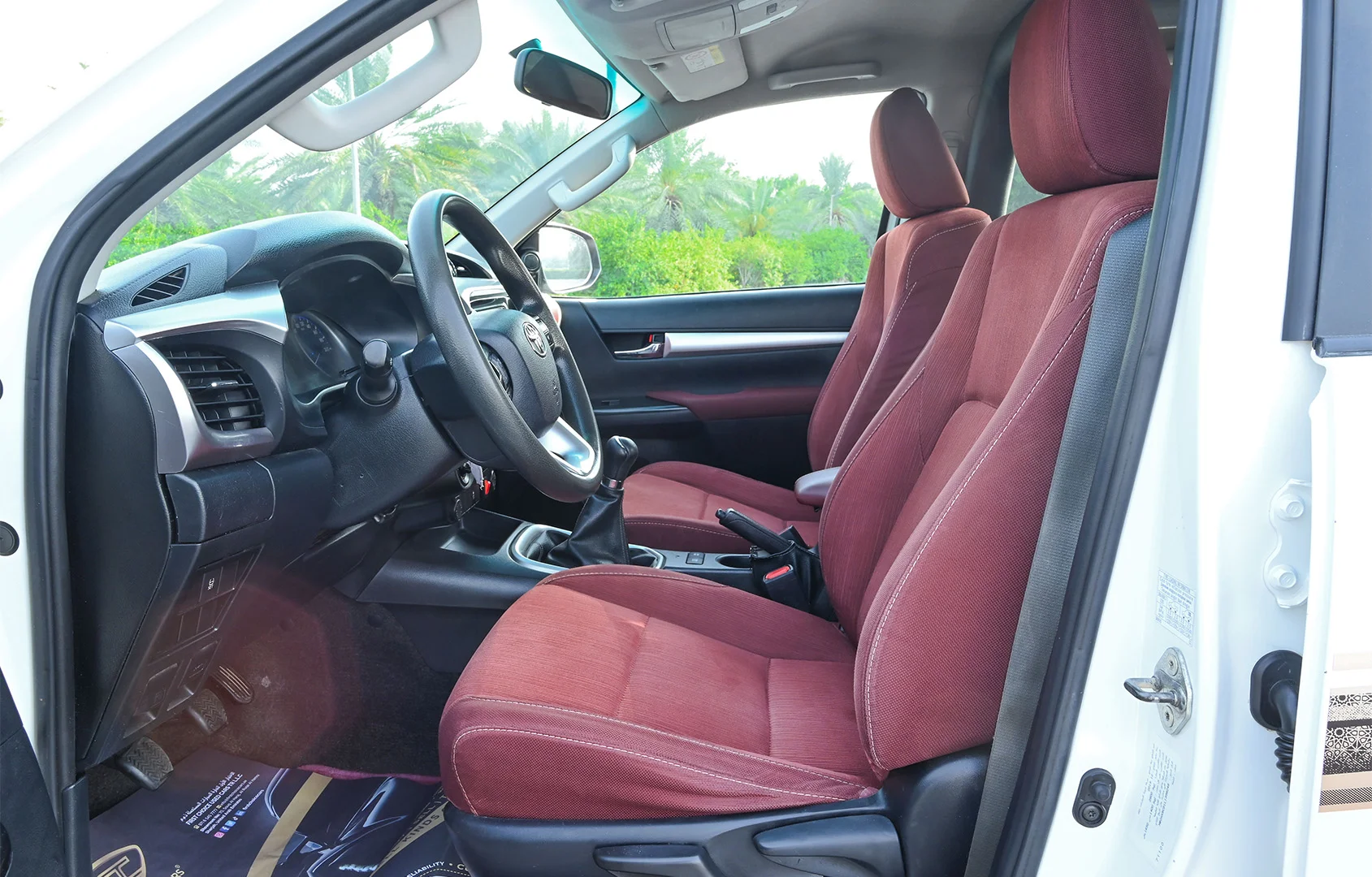 Used 2020 Toyota Hilux GLX Double Cabin White – Front Driver Side Cabin View at First Choice Cars Sharjah