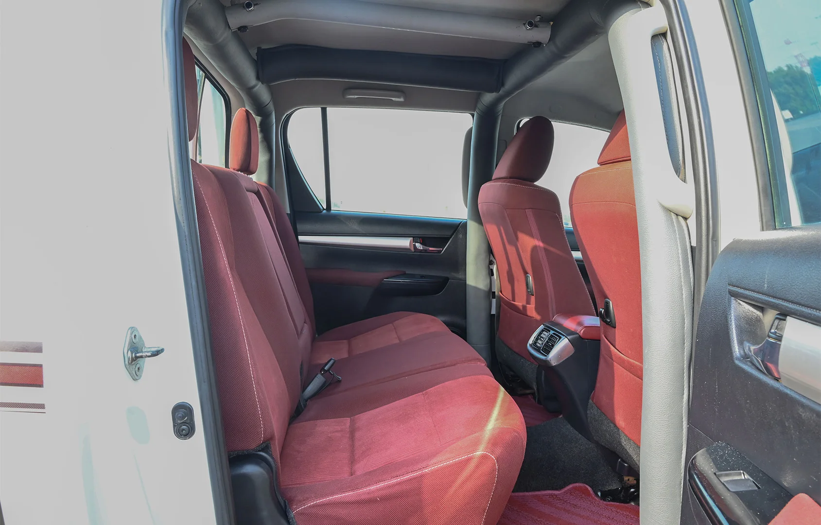 Used 2020 Toyota Hilux GLX Double Cabin White – Rear Passenger Side Cabin View at First Choice Cars Sharjah