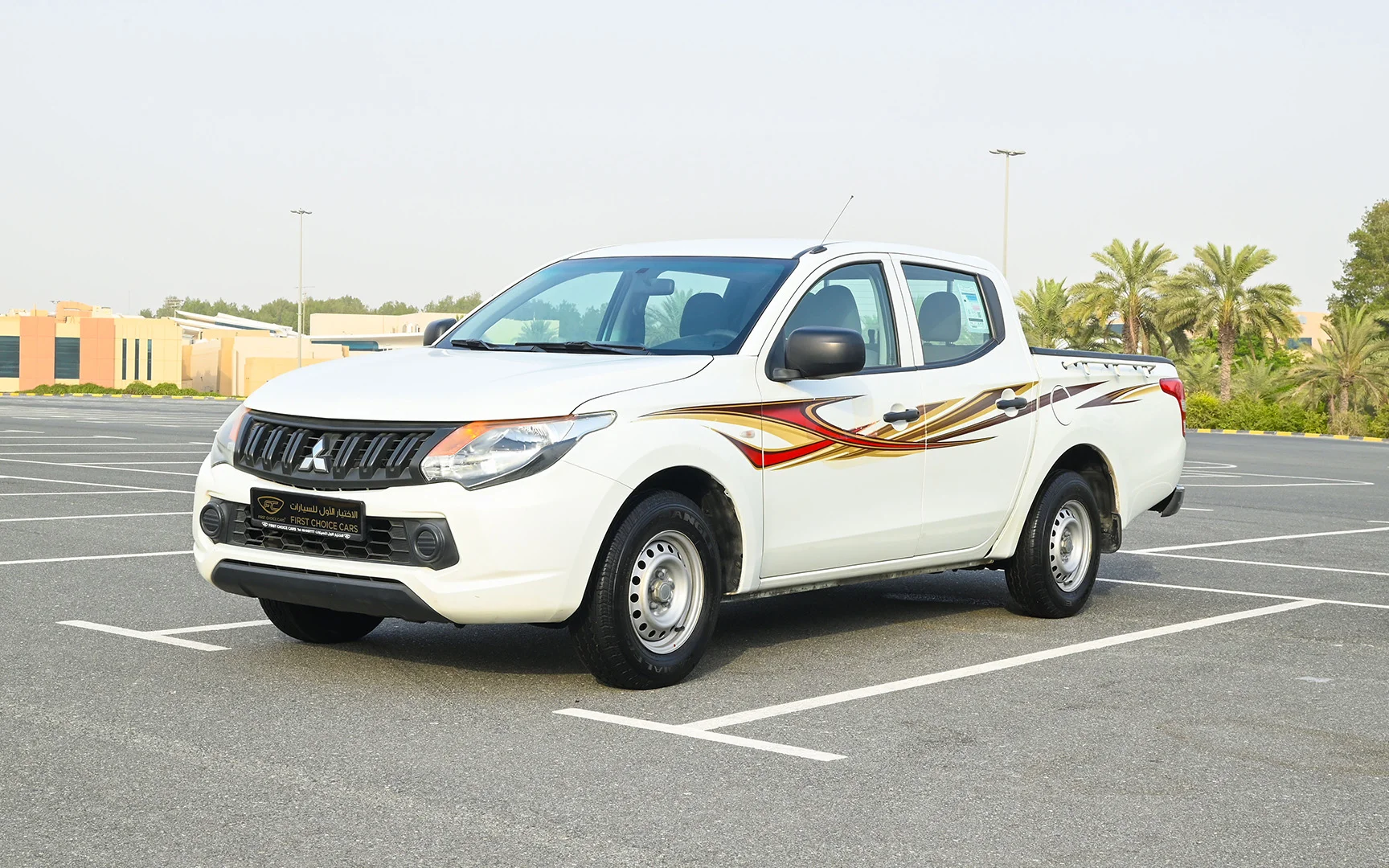 Used 2018 Mitsubishi L200 GL Double Cabin in White – Left Front Diagonal (45°) View for Sale at First Choice Cars Dubai Sharjah