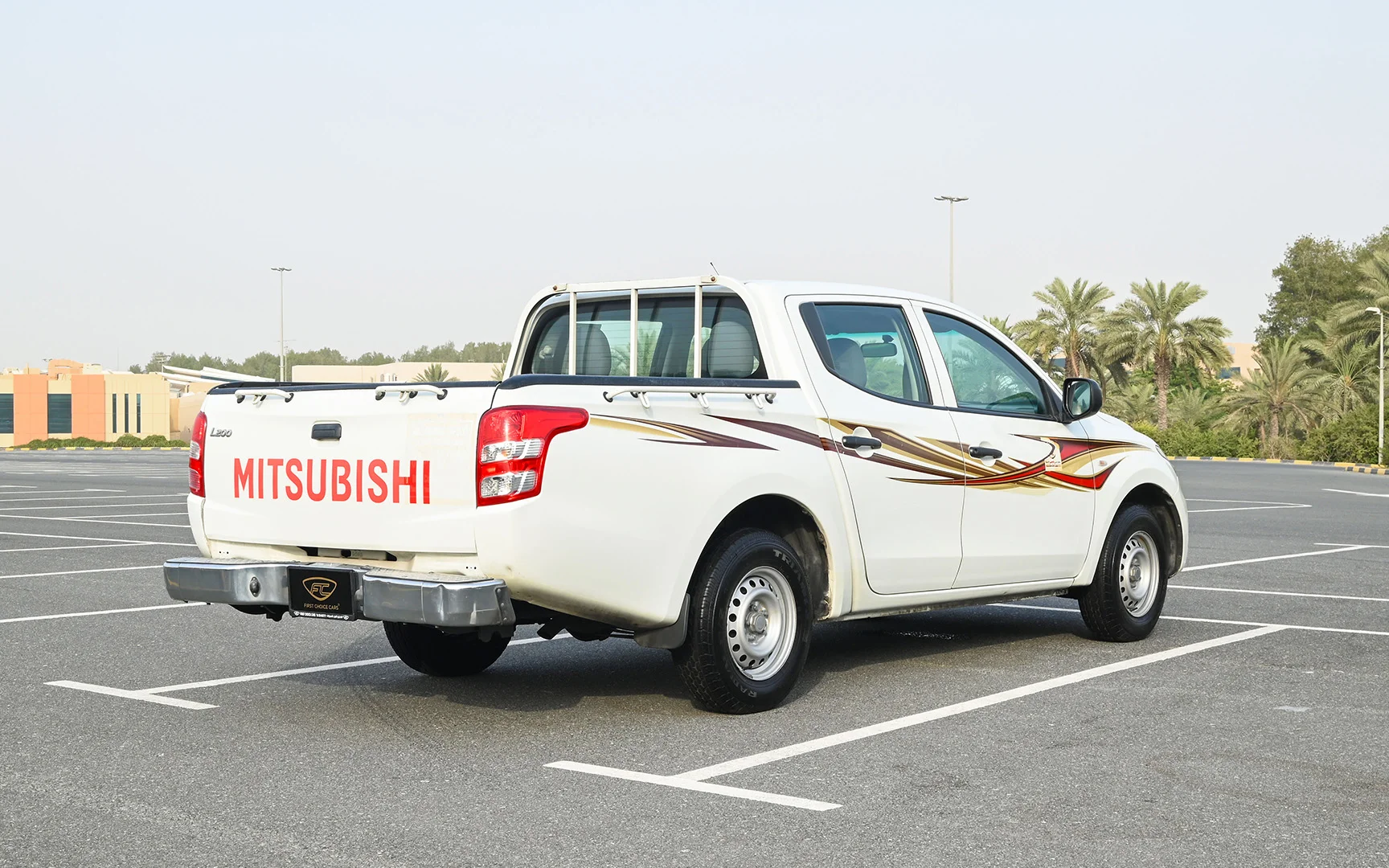 Used 2018 Mitsubishi L200 GL Double Cabin in White – Right Back Diagonal (45°) View for Sale at First Choice Cars Dubai Sharjah