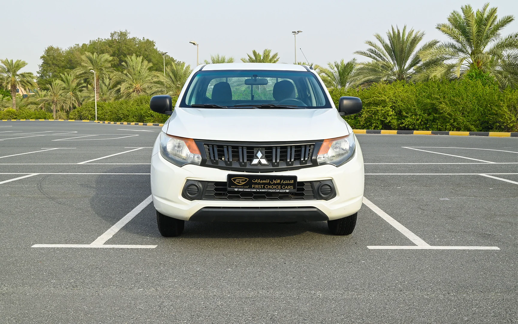 Used 2018 Mitsubishi L200 GL Double Cabin in White – Front View for Sale at First Choice Cars Dubai Sharjah