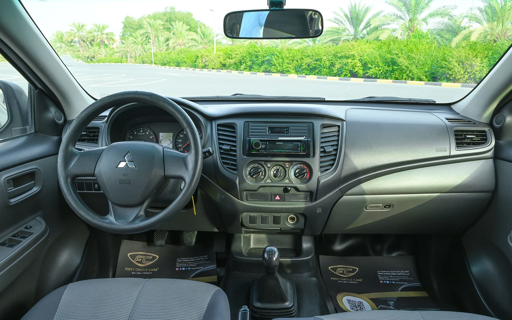 Used 2018 Mitsubishi L200 GL Double Cabin in White – Front Cabin / Dashboard Full View for Sale at First Choice Cars Dubai Sharjah