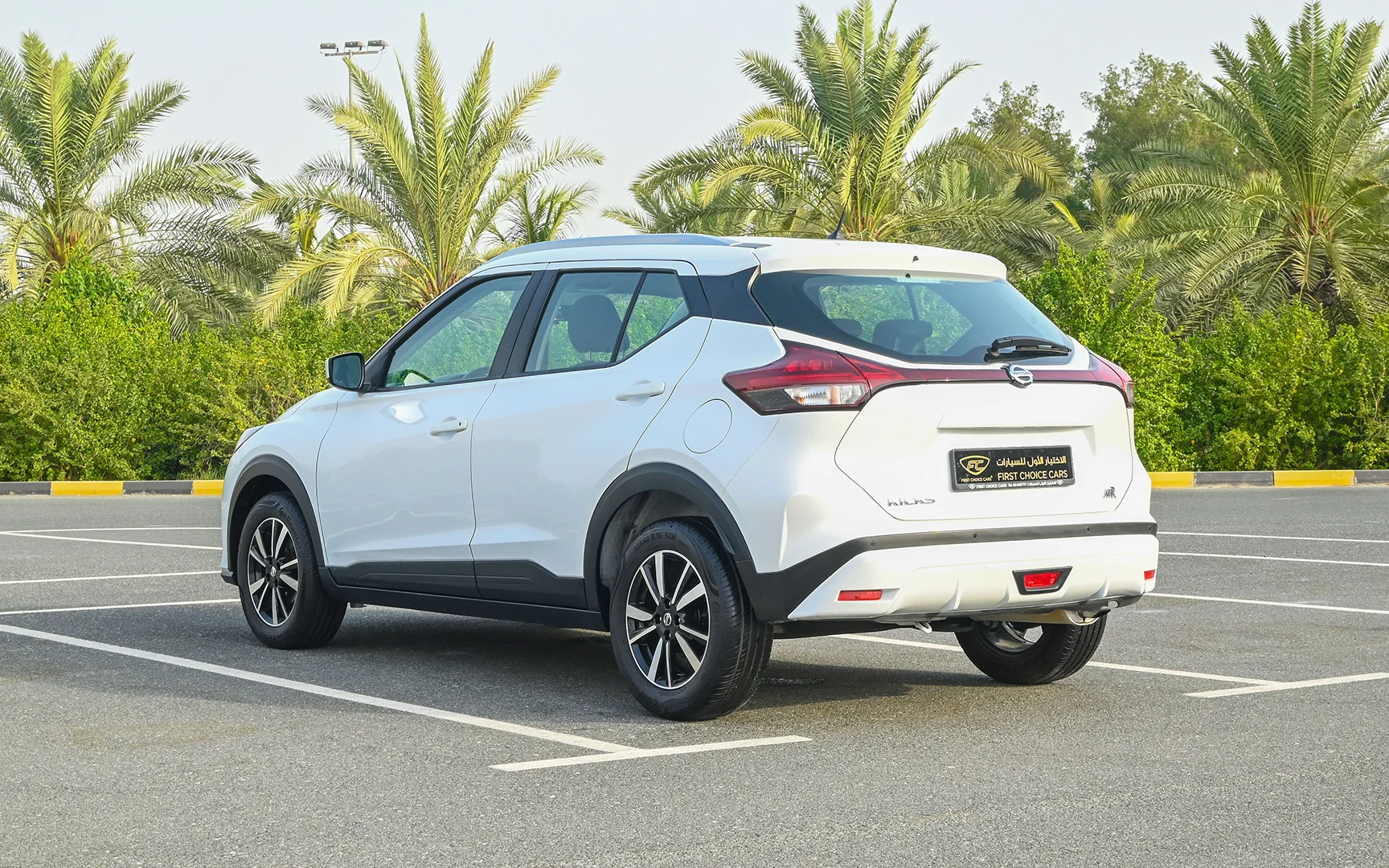 Used 2022 Nissan Kicks S White – Left Back Diagonal (45°) View at First Choice Cars Sharjah
