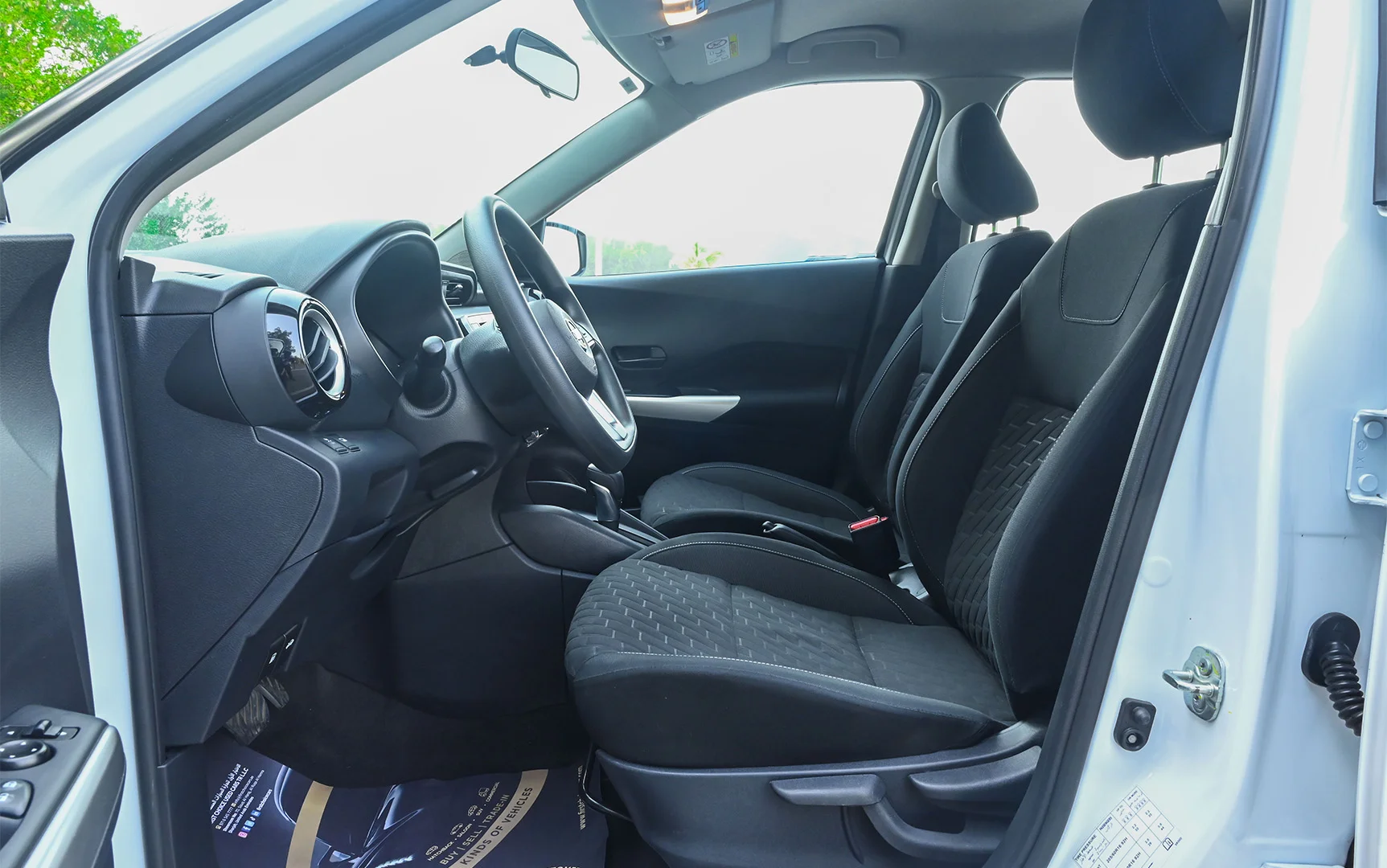 Used 2022 Nissan Kicks S White – Front Driver Side Cabin View at First Choice Cars Sharjah