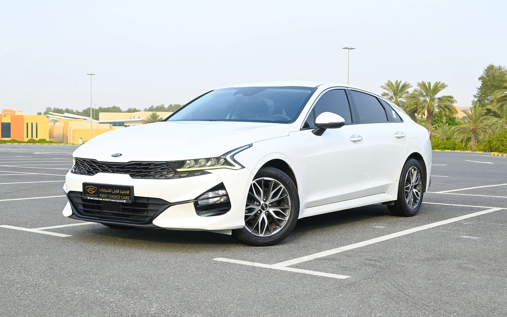 Used 2020 Kia K5 LX in White – Left Front Diagonal (45°) View for Sale at First Choice Cars Dubai Sharjah