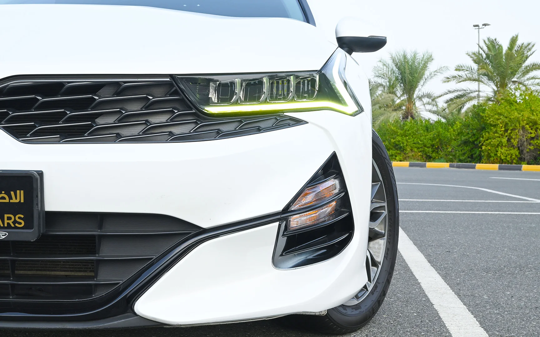 Used 2020 Kia K5 LX in White – Headlight Close-up for Sale at First Choice Cars Dubai Sharjah