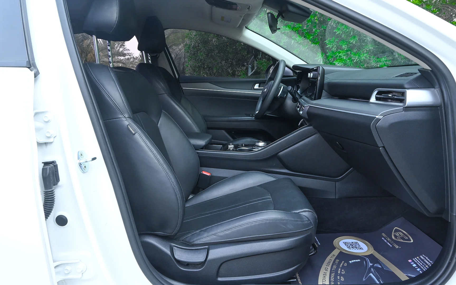 Used 2020 Kia K5 LX in White – Front Passenger Side Cabin View for Sale at First Choice Cars Dubai Sharjah