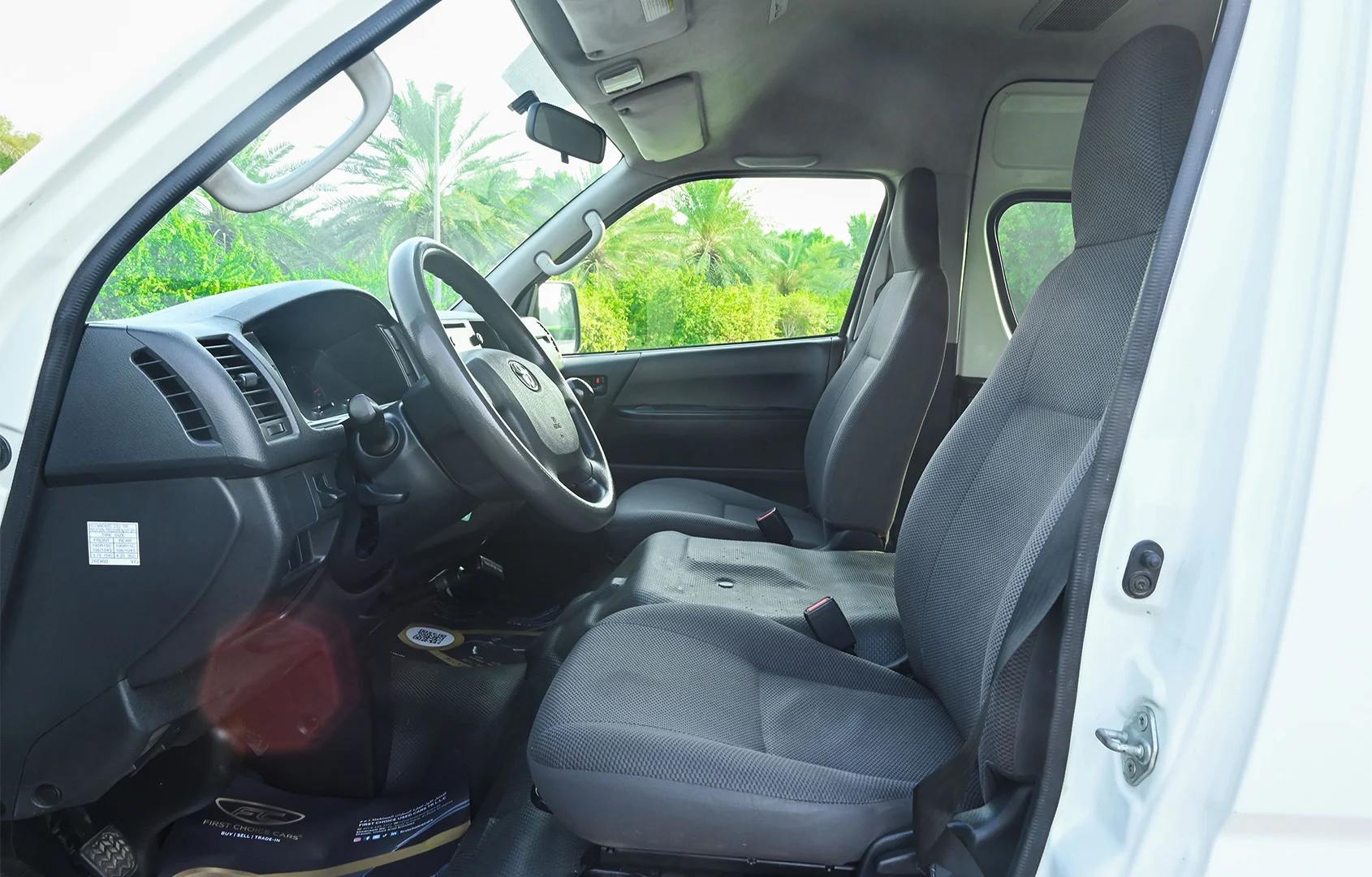 Used 2018 Toyota Hiace GLX High Roof White – Front Driver Side Cabin View at First Choice Cars Sharjah