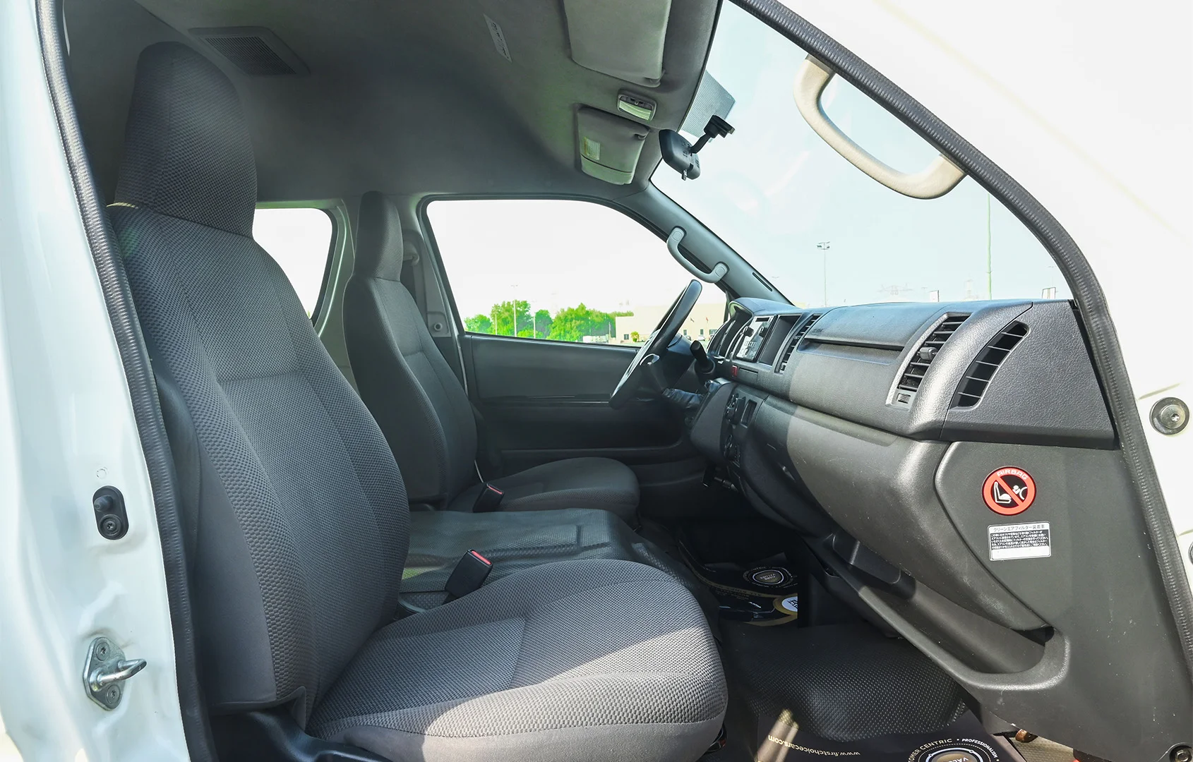 Used 2018 Toyota Hiace GLX High Roof White – Front Passenger Side Cabin View at First Choice Cars Sharjah