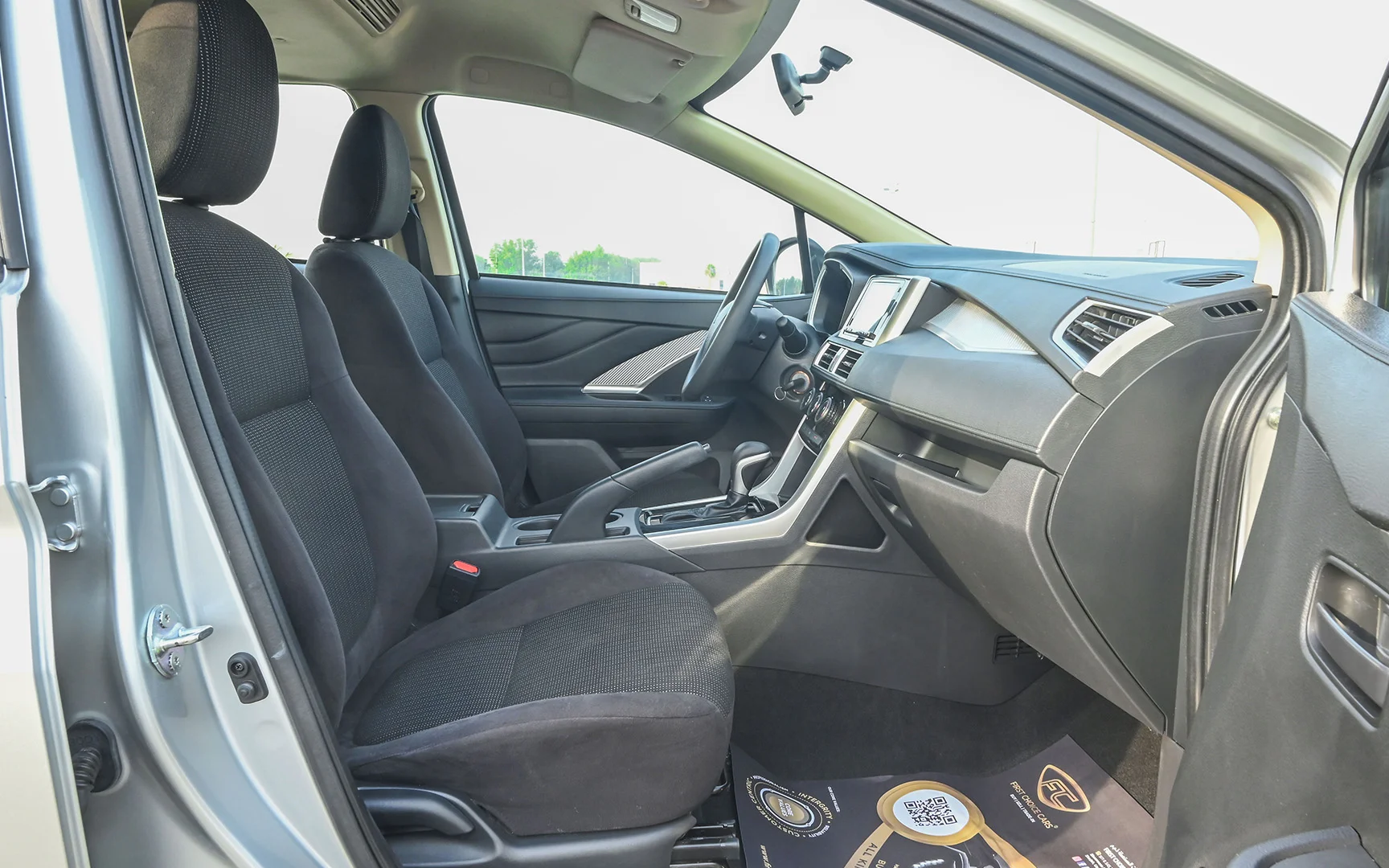 Used 2021 Mitsubishi XPANDER Highline Silver – Front Passenger Side Cabin View at First Choice Cars Sharjah