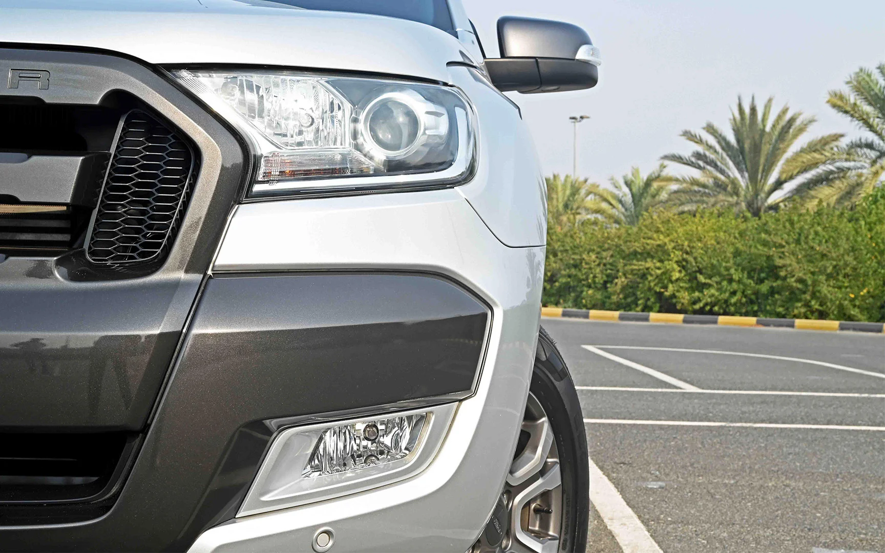 Used 2021 Ford Ranger Wildtrak in Silver – Headlight Close-up for Sale at First Choice Cars Dubai Sharjah