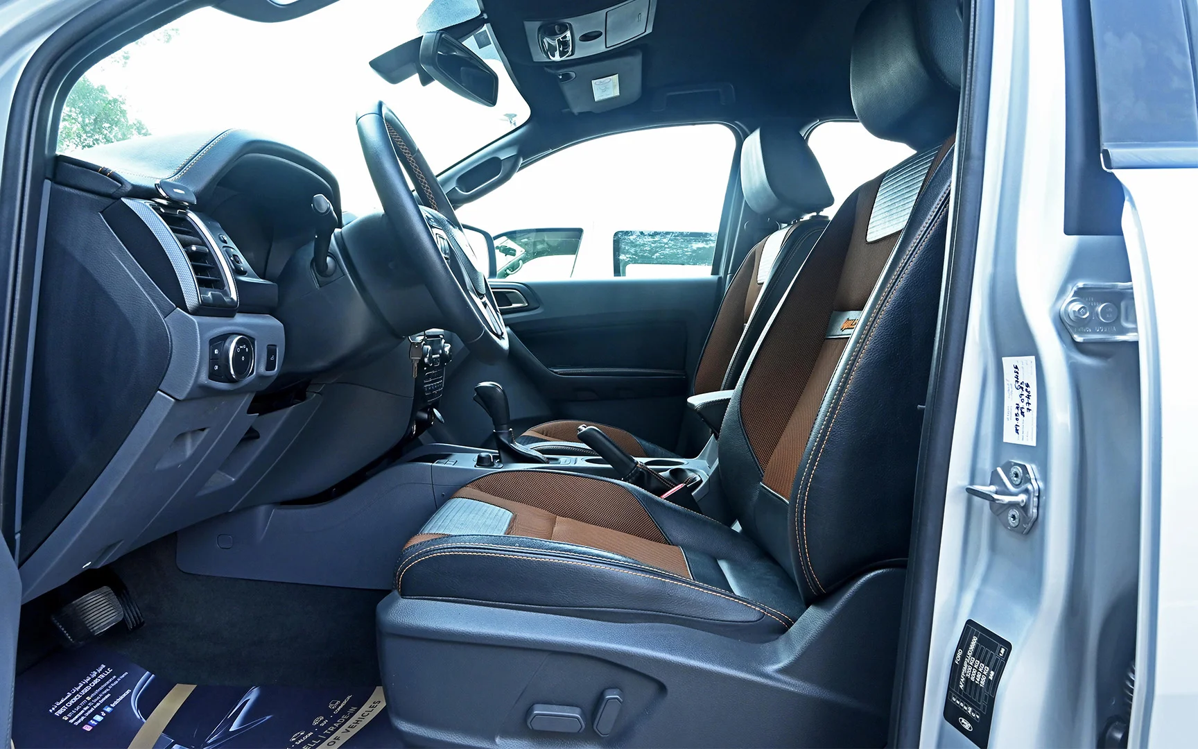 Used 2021 Ford Ranger Wildtrak Silver – Front Driver Side Cabin View at First Choice Cars Sharjah