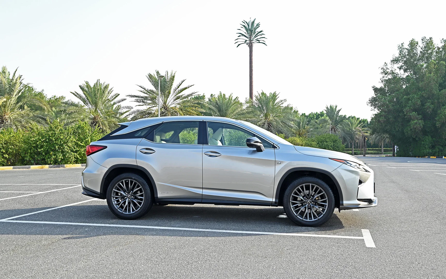Used 2017 Lexus RX-Series RX 450h F Sport Silver – Right Side View at First Choice Cars Sharjah