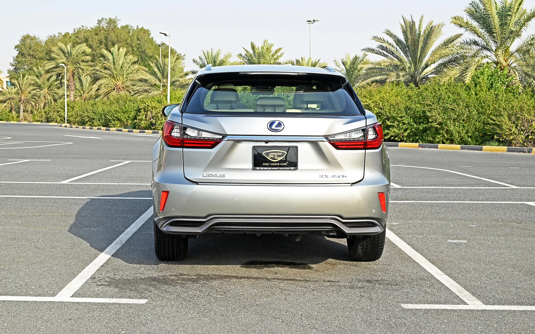 Used 2017 Lexus RX-Series RX 450h F Sport Silver – Back/Rear View at First Choice Cars Sharjah