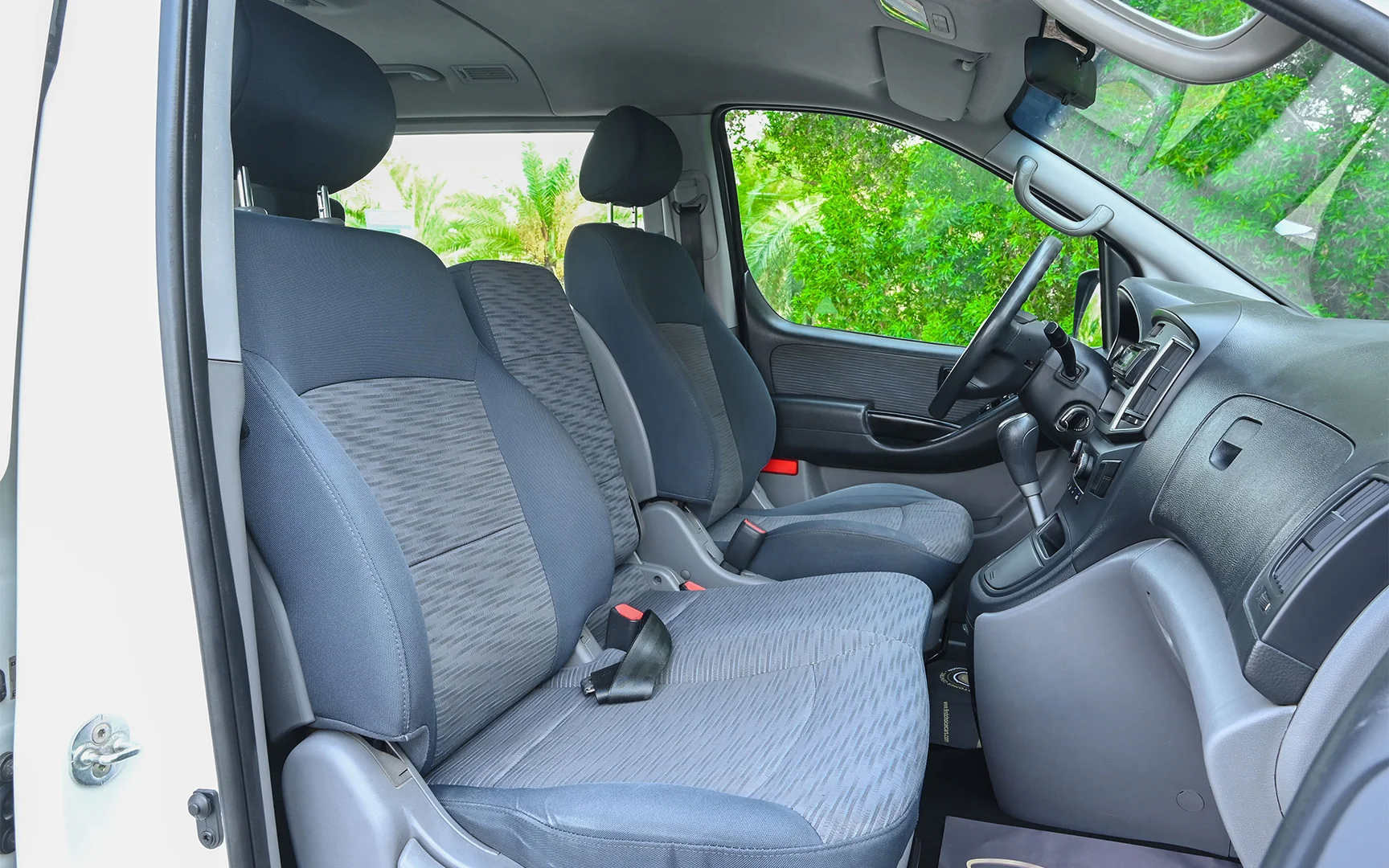 Used 2018 Hyundai H1 12-Seater Wagon White – Front Passenger Side Cabin View at First Choice Cars Sharjah